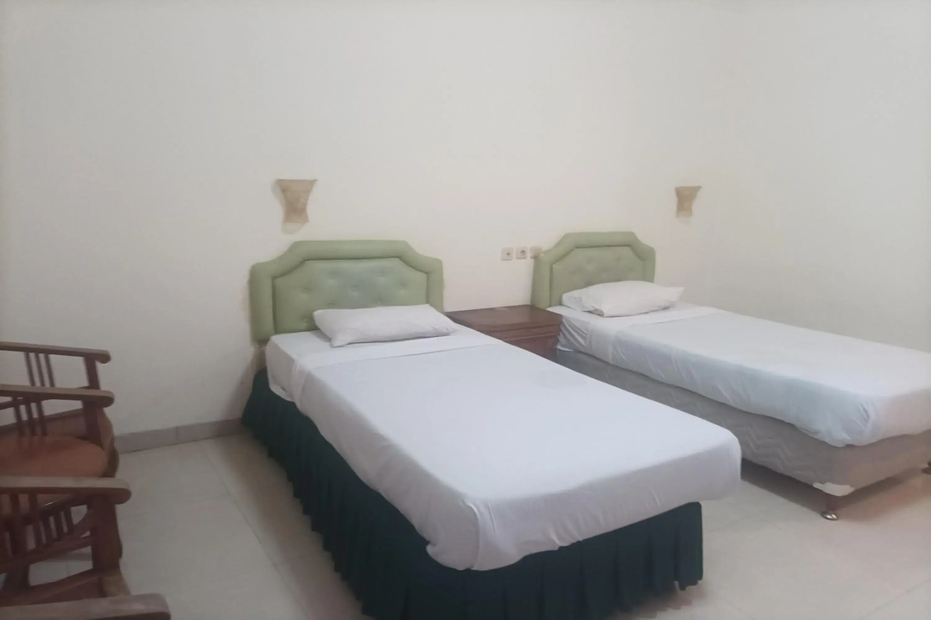 Bed in RedDoorz Plus near Alun Alun Kejaksan Cirebon