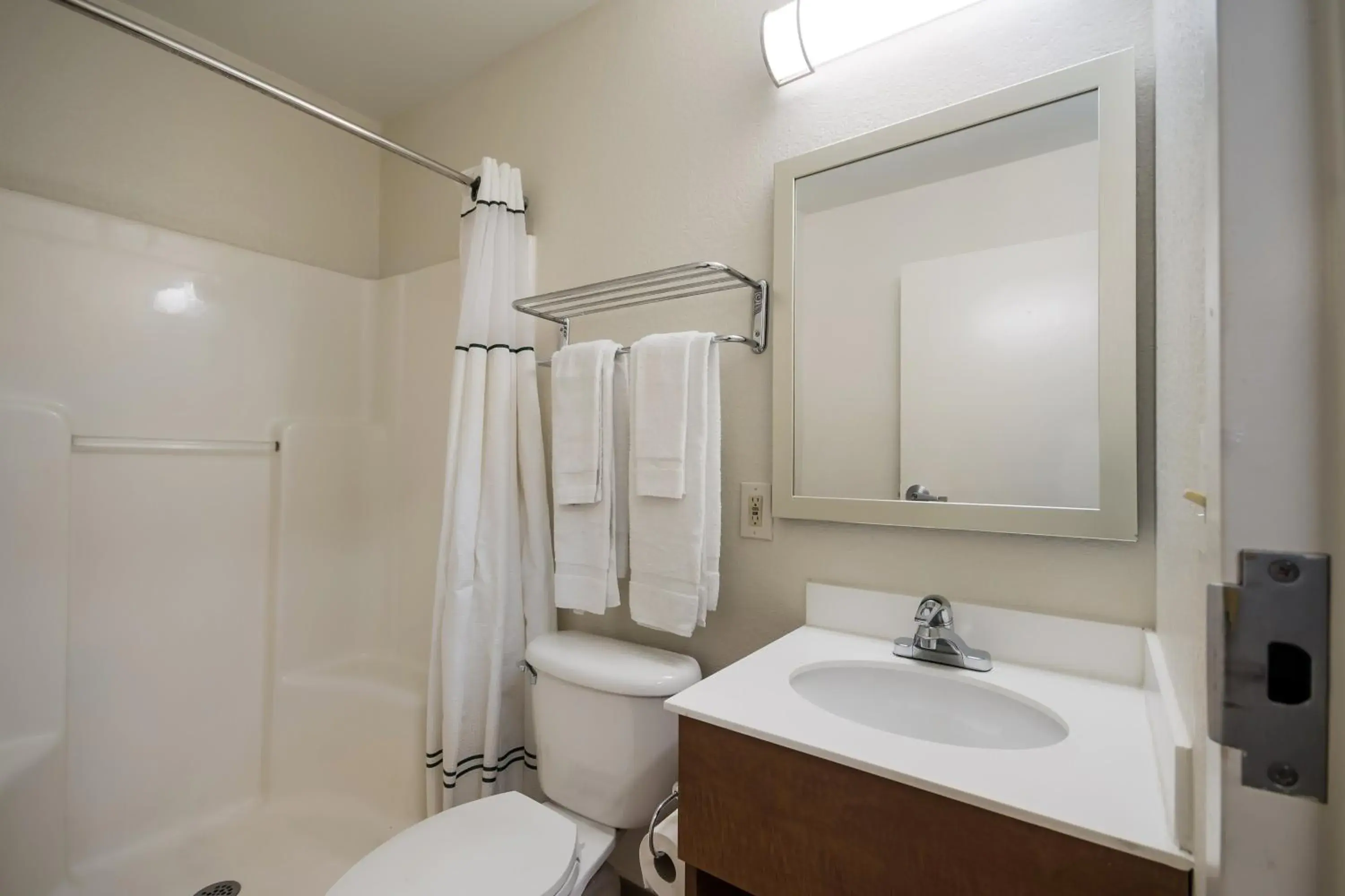 Photo of the whole room, Bathroom in HomeTowne Studios by Red Roof Seattle - Kent/Des Moines