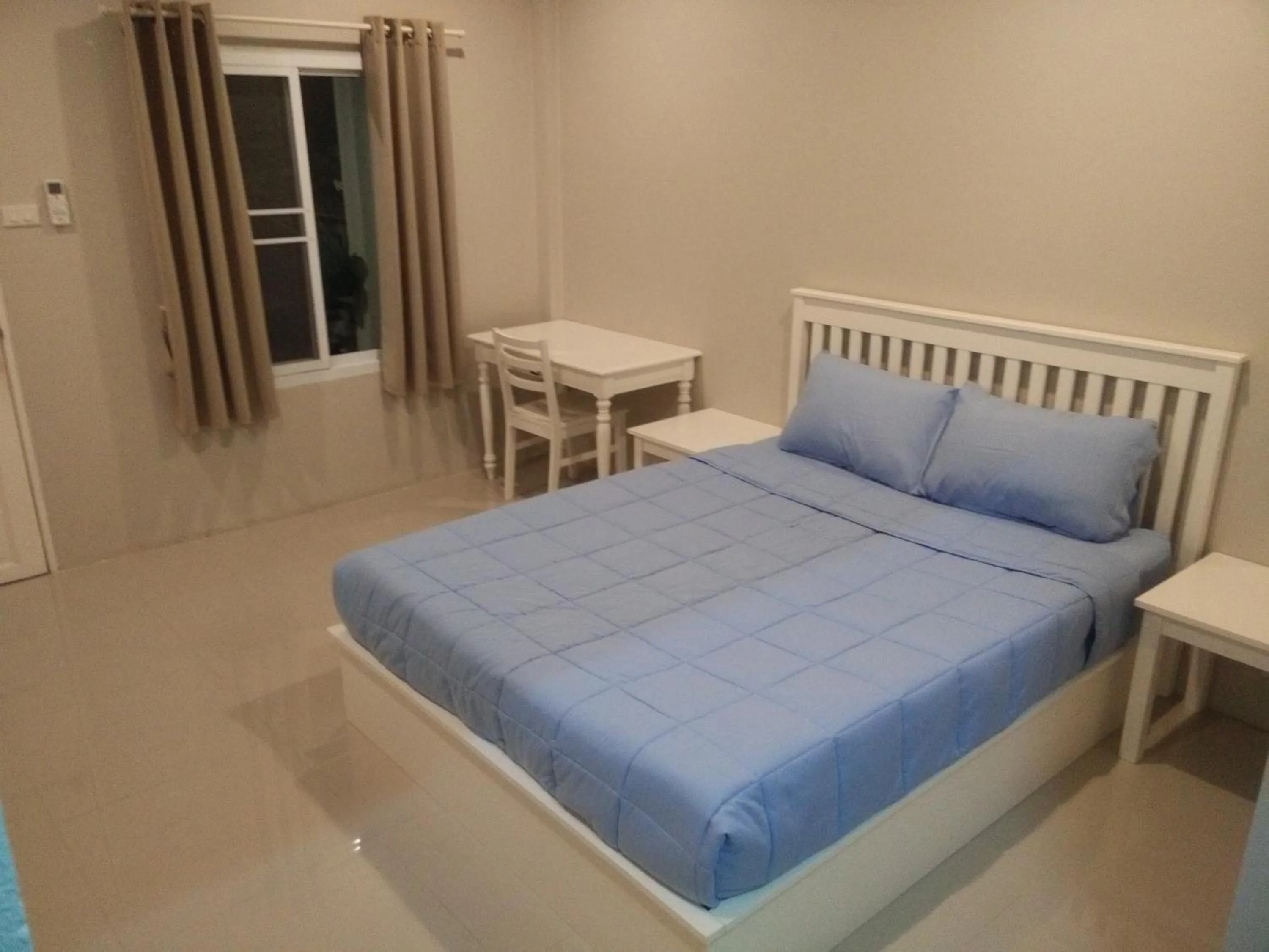 Bed in Vanilla Ville Resort