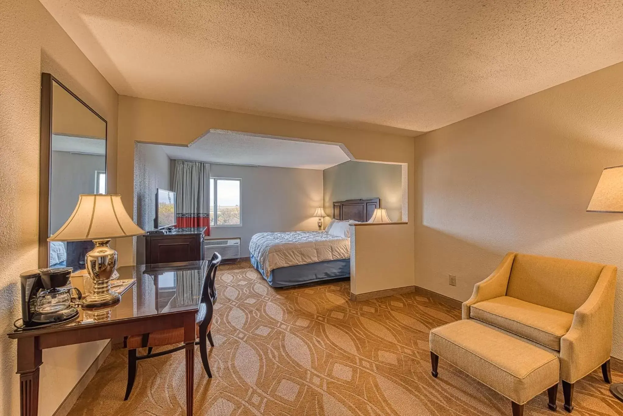 Bed in American Inn & suites Bed in American Inn & suites