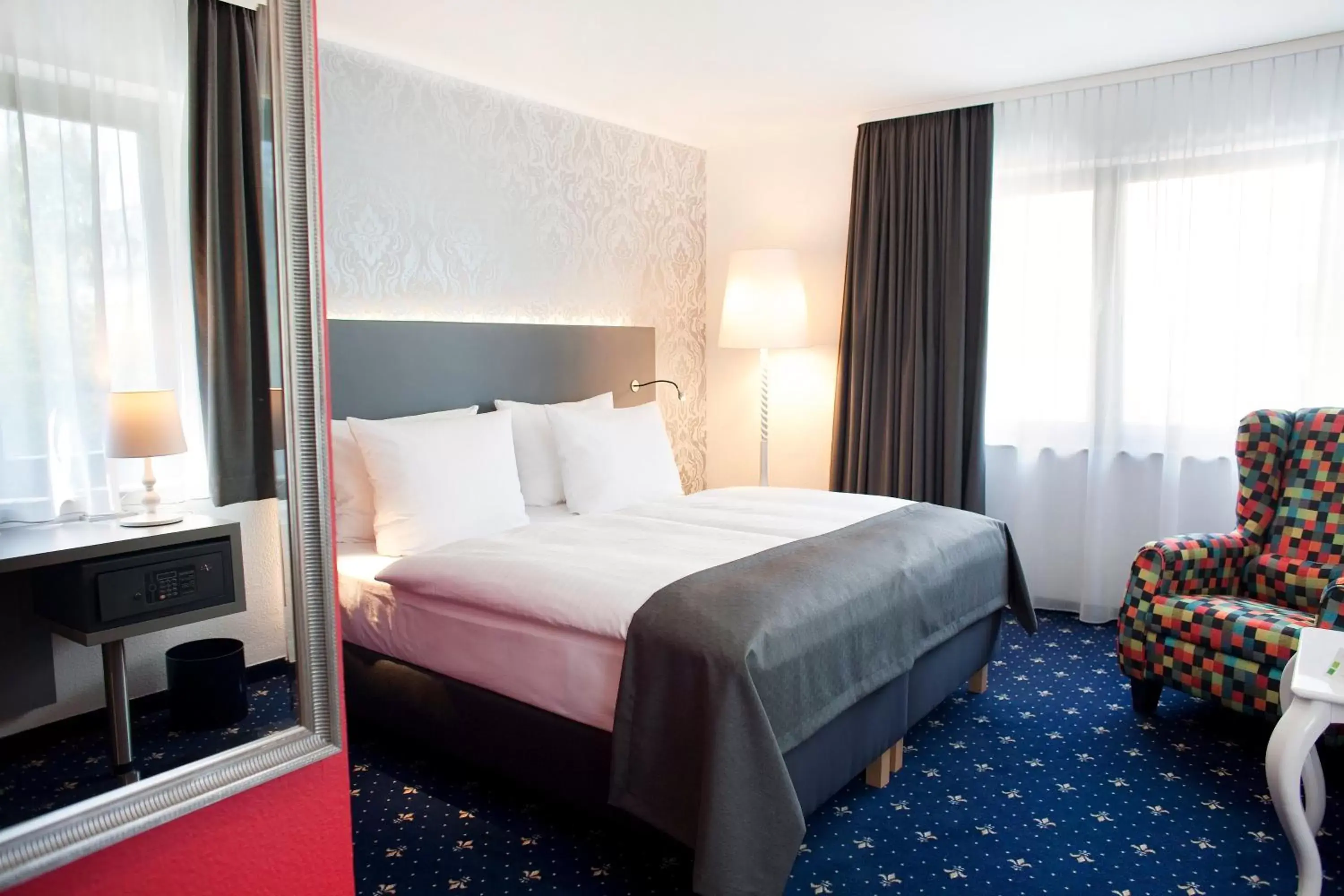 Photo of the whole room, Bed in Holiday Inn Dresden - City South, an IHG Hotel