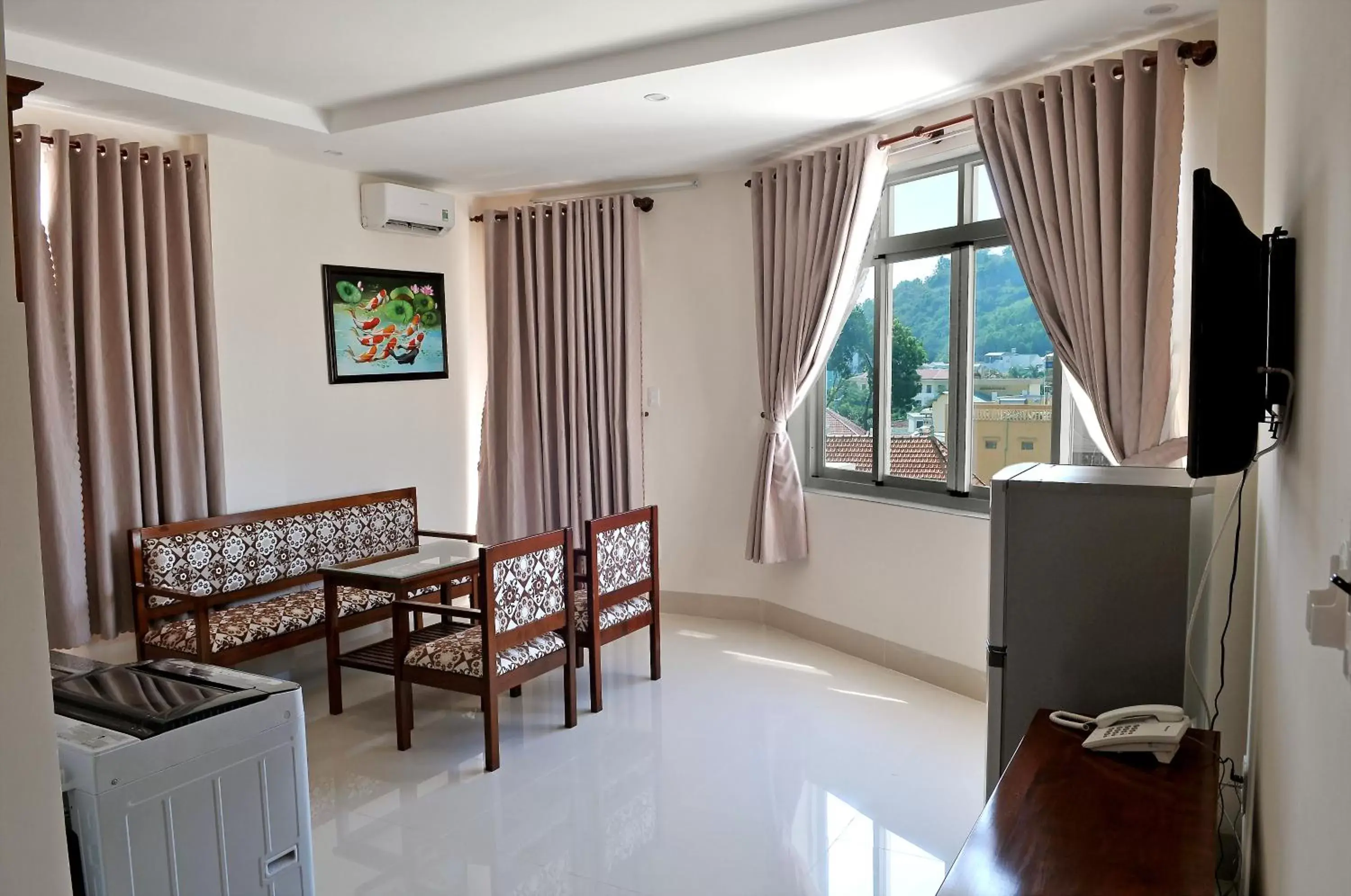 Living room, Seating Area in Lotus Apartment Hotel