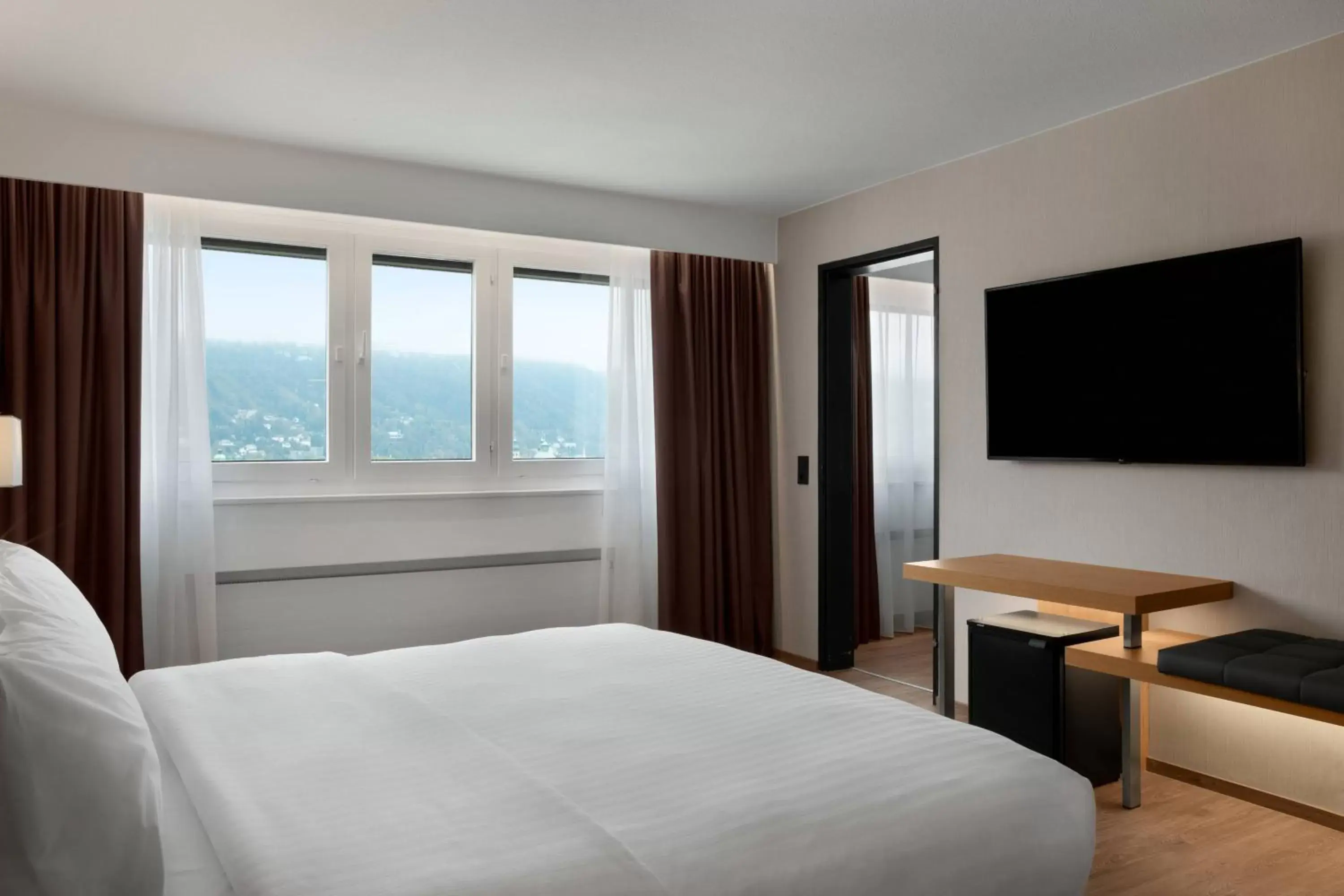 Bedroom, TV/Entertainment Center in AC Hotel by Marriott Innsbruck