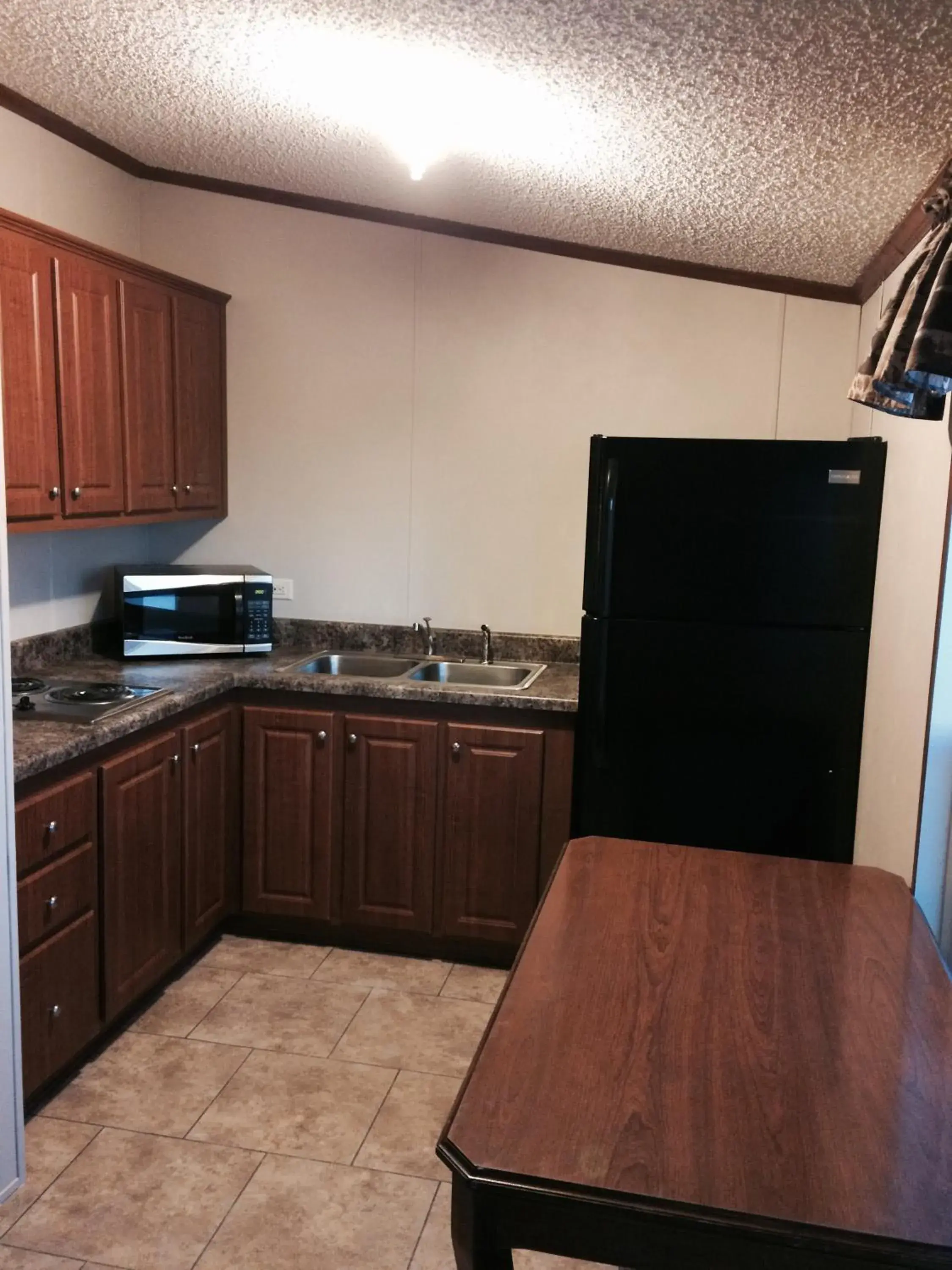 Kitchen or kitchenette, Kitchen/Kitchenette in Oasis Lodge