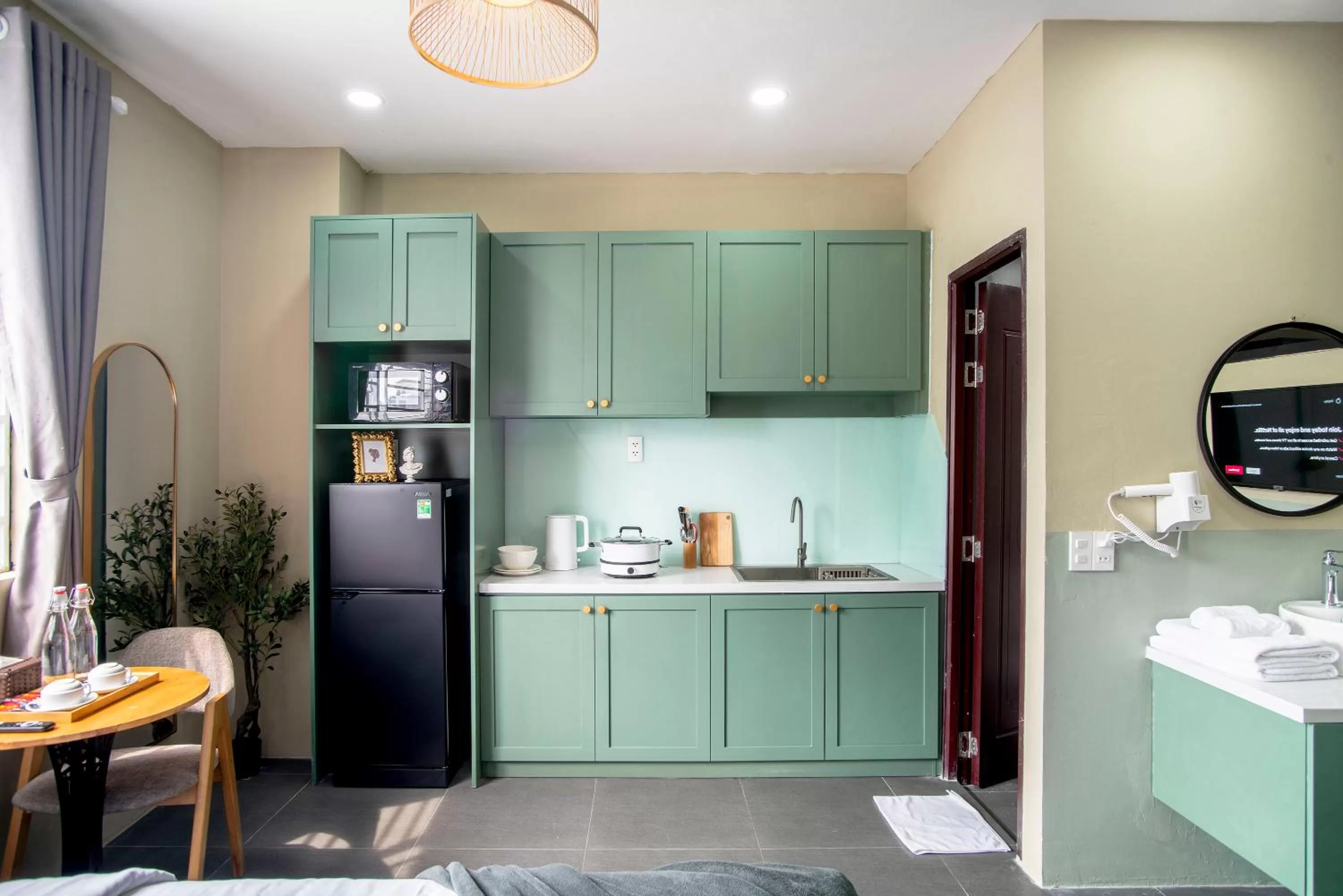 Kitchen or kitchenette in SAZI BEN THANH Hotel HCM