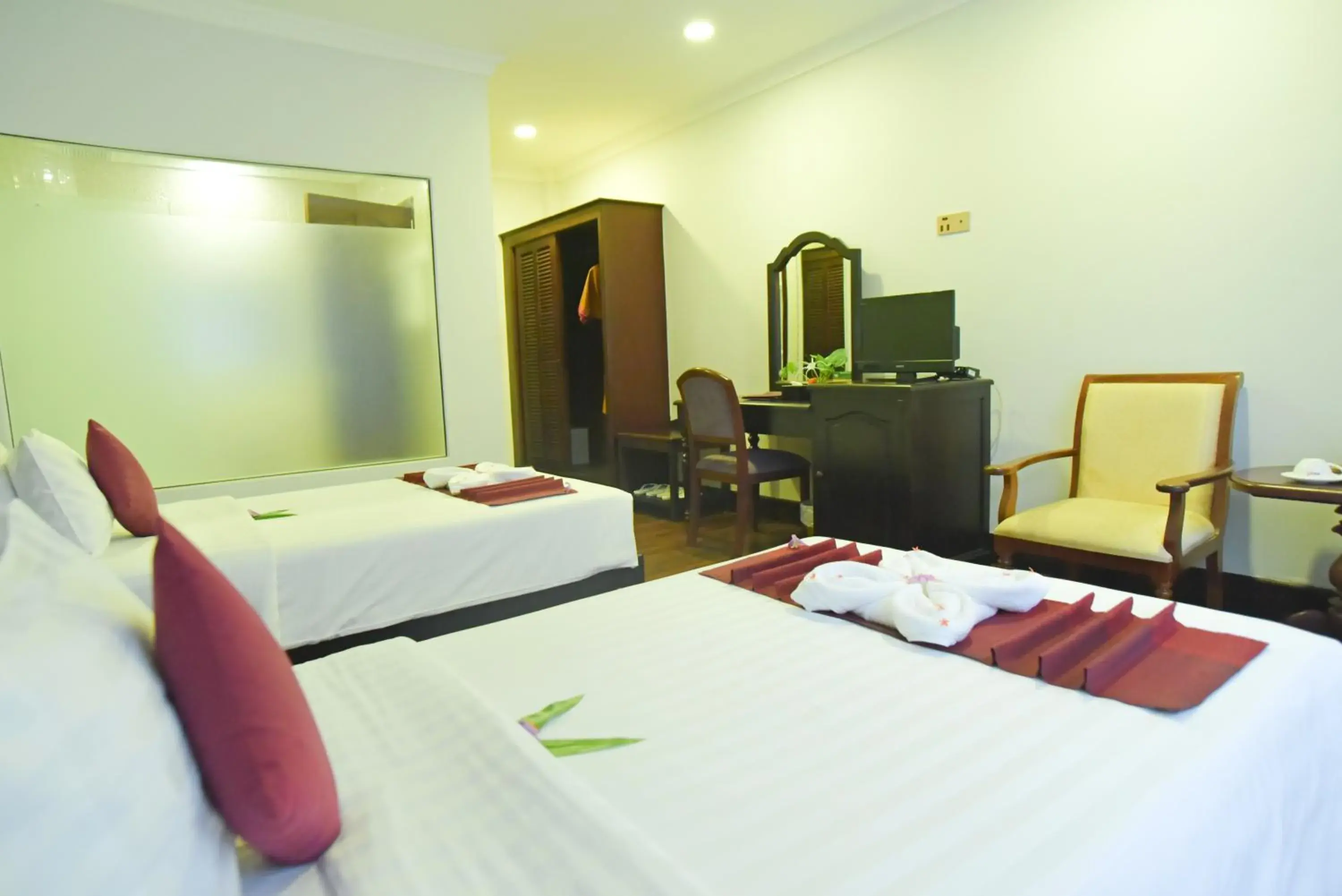 Bed in Lucky Angkor Hotel & Spa