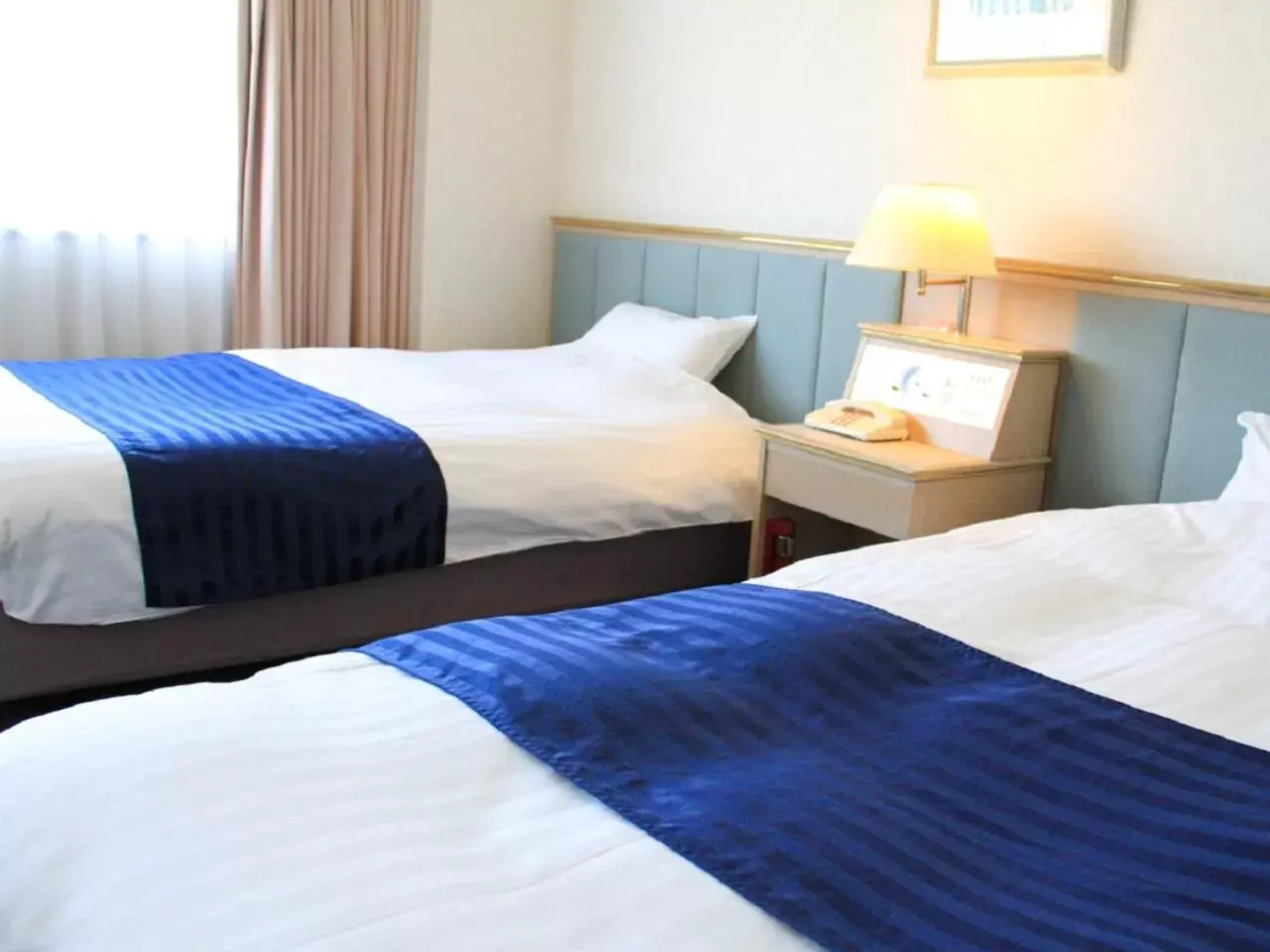 Bed in HOTEL LiVEMAX BUDGET Kagoshima