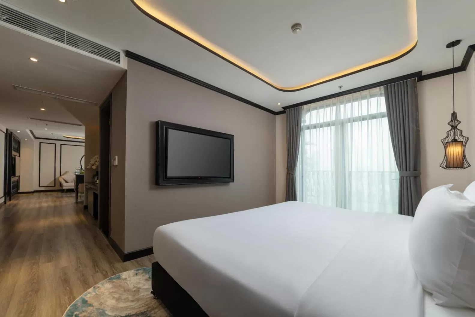 Communal lounge/ TV room, Bed in FTE Ba Dinh Hotel