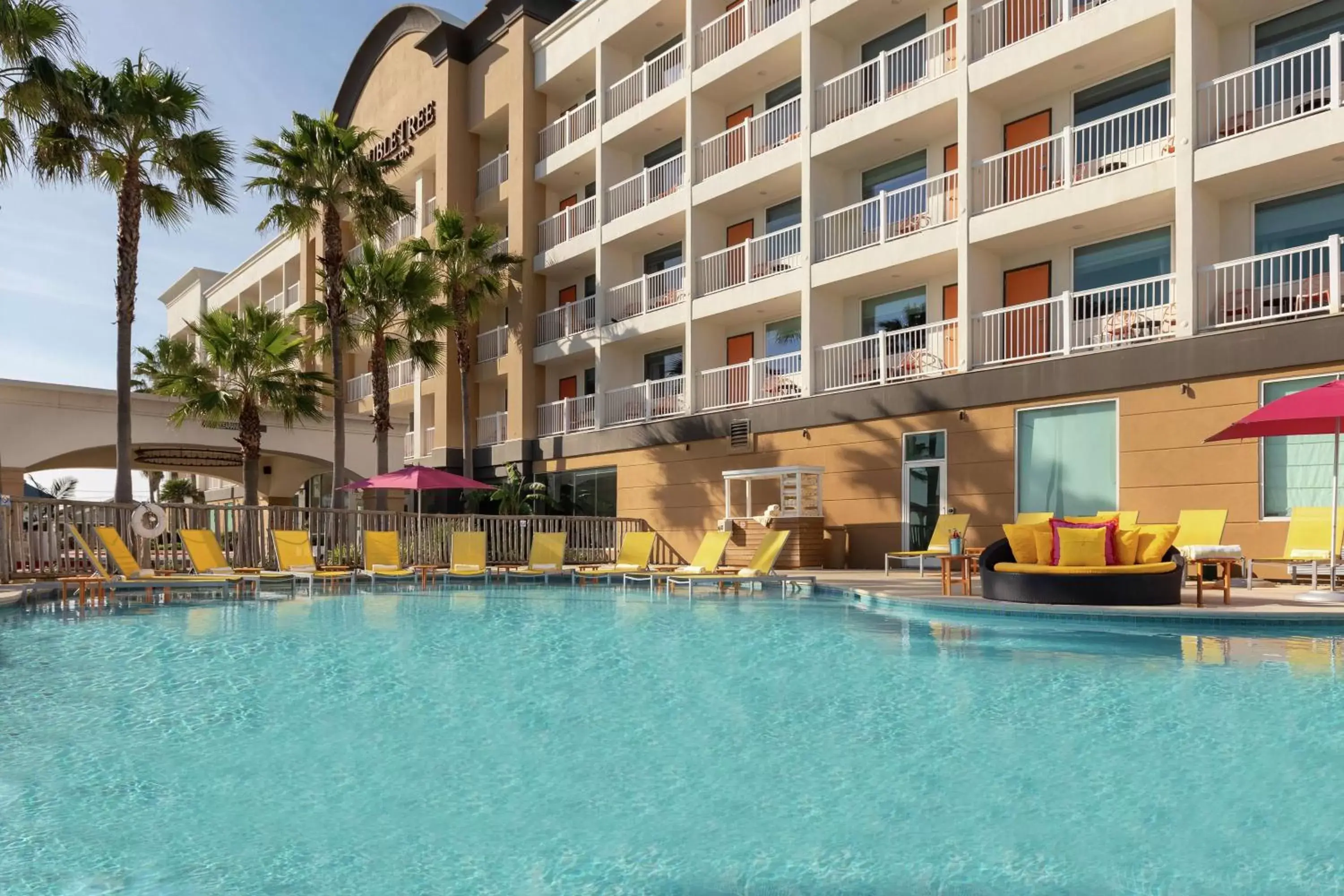 Property building, Swimming Pool in DoubleTree by Hilton Galveston Beach
