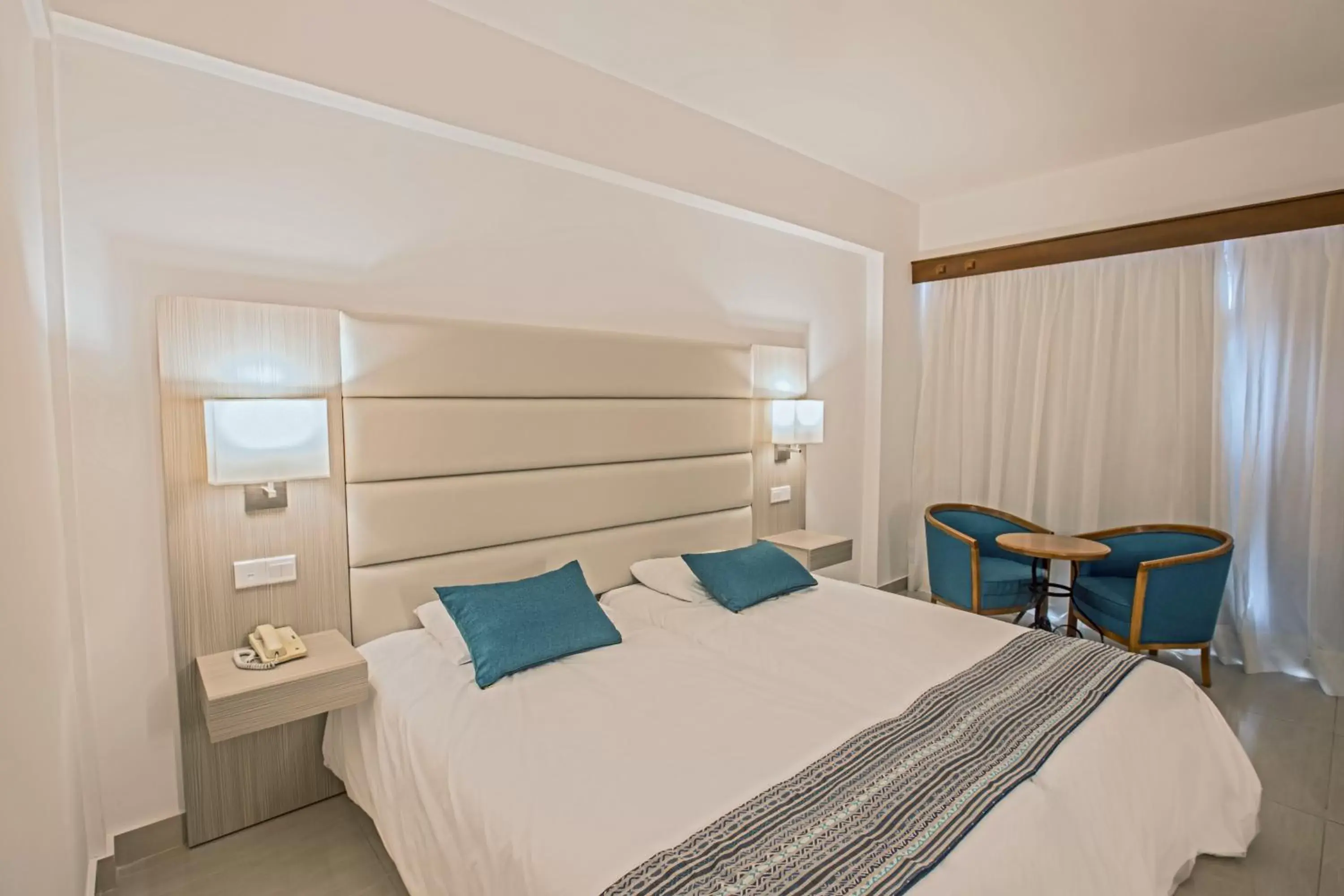 Bed in Anmaria Beach Hotel & Spa