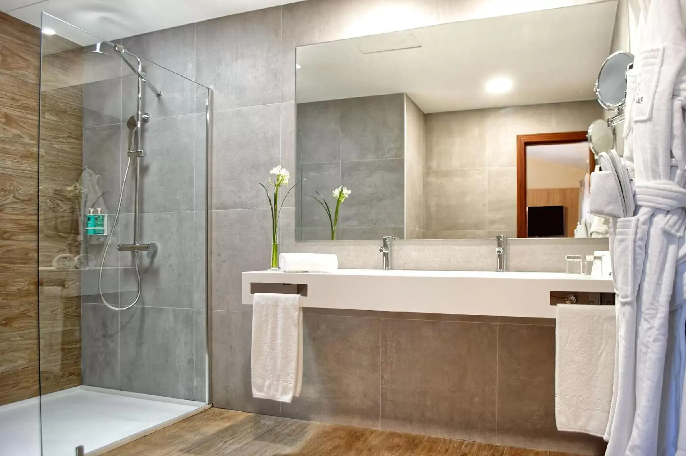 Shower, Bathroom in Suites & Villas by Dunas