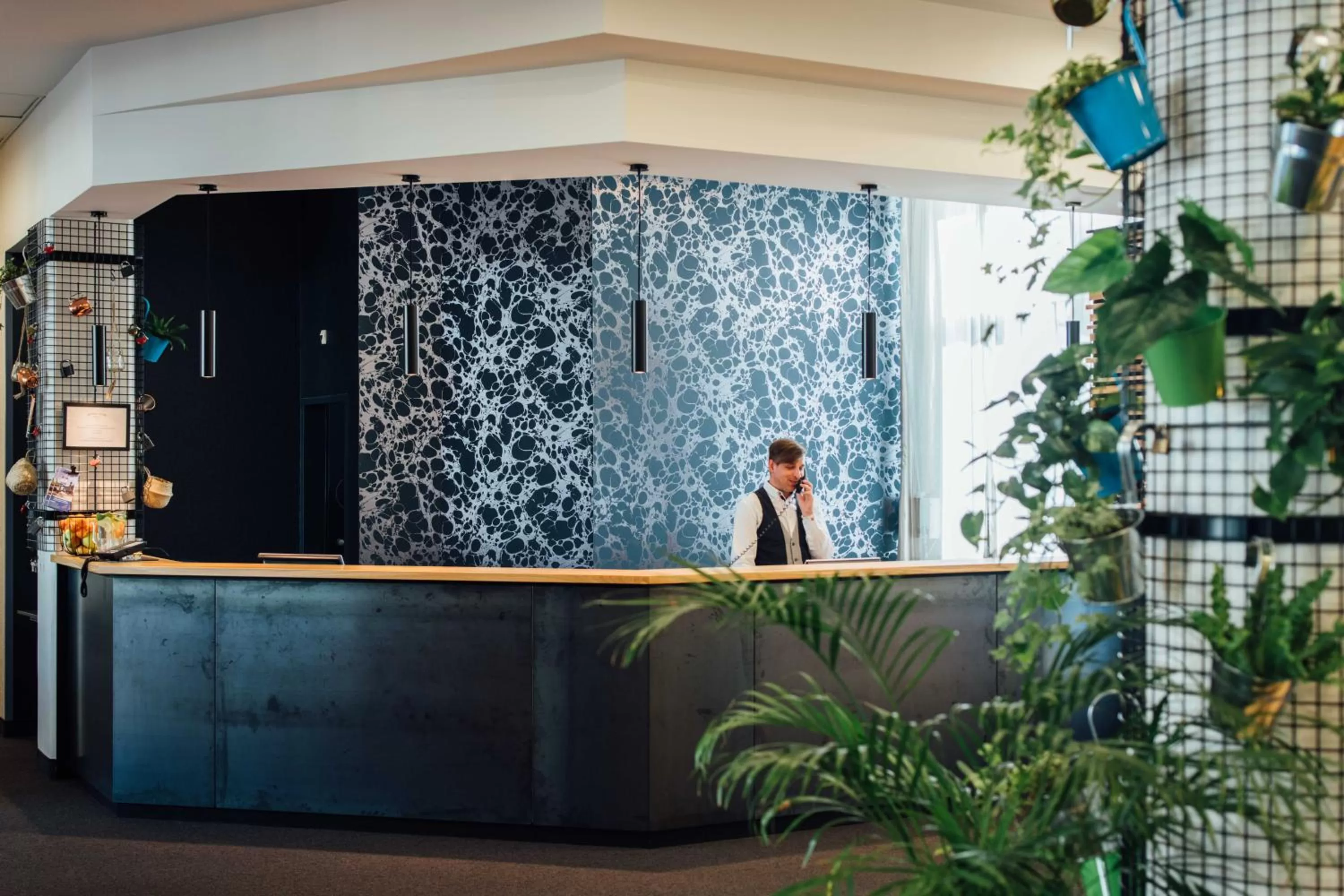 Lobby or reception in Vienna House Easy by Wyndham Cracow