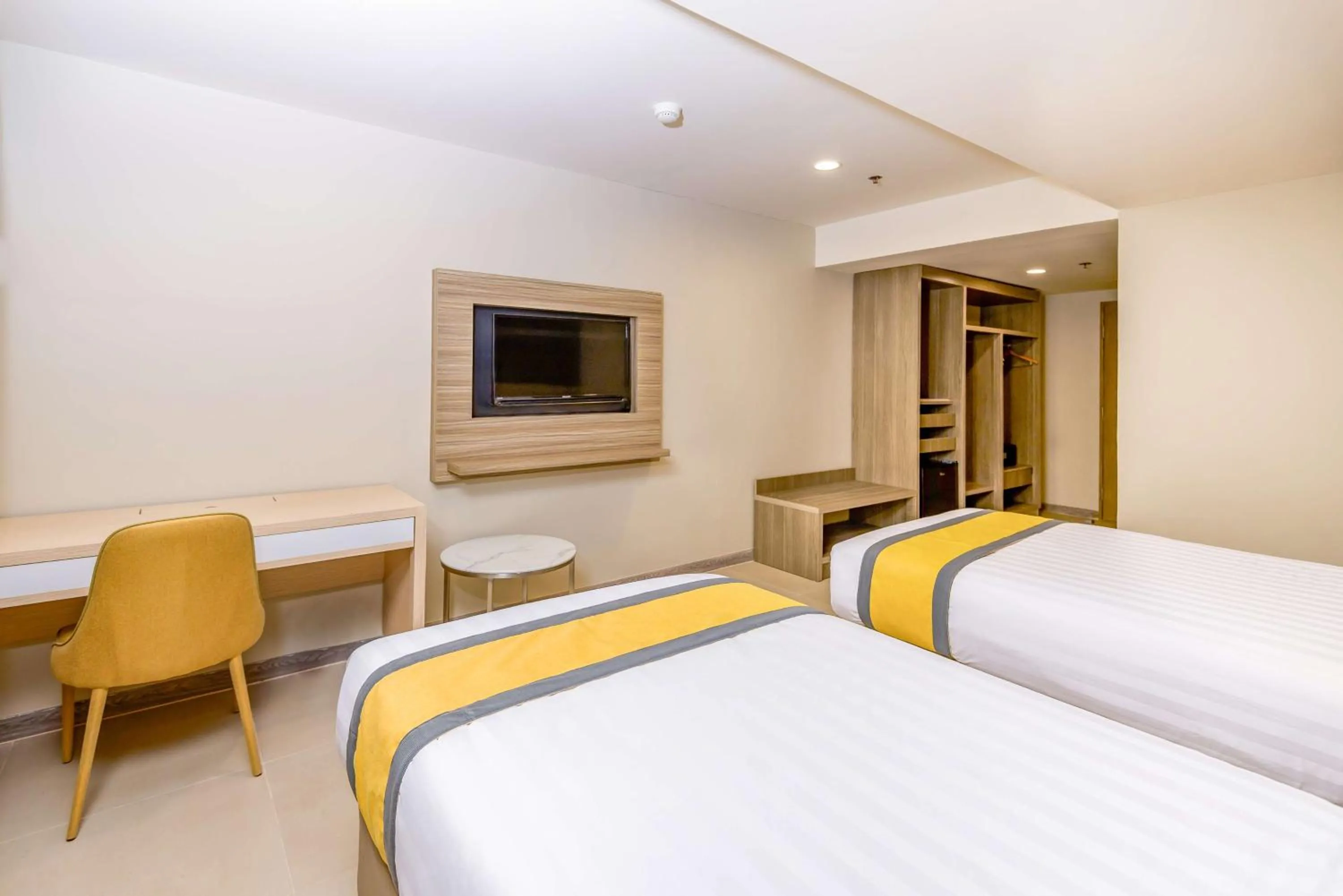 Bedroom, Bed in SureStay Plus by Best Western Cebu City