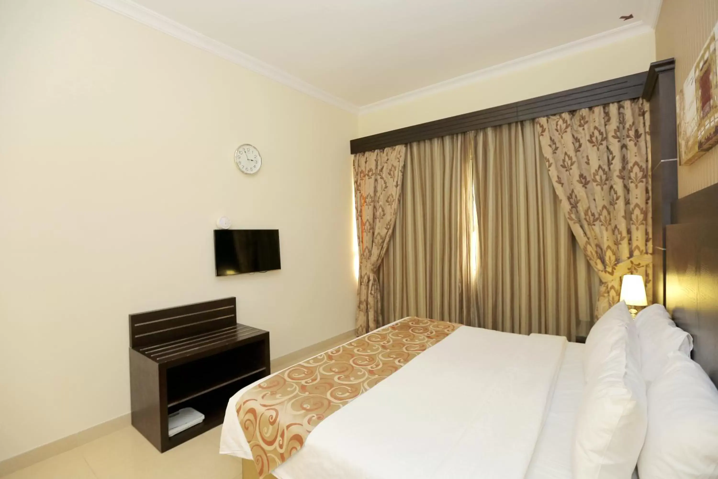 Bed in Ivory Grand Hotel Apartments