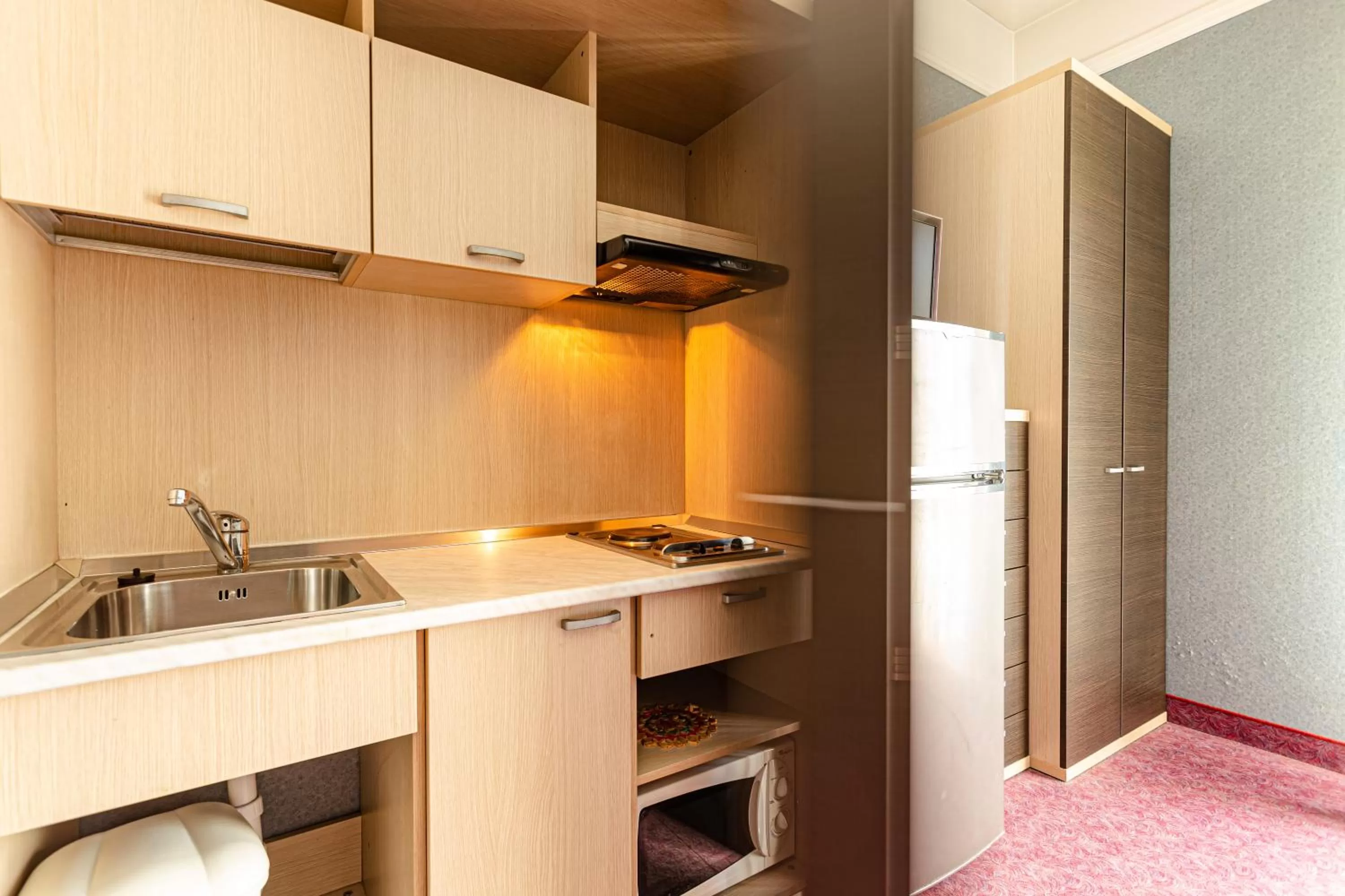 Kitchen or kitchenette in Residence & Suites