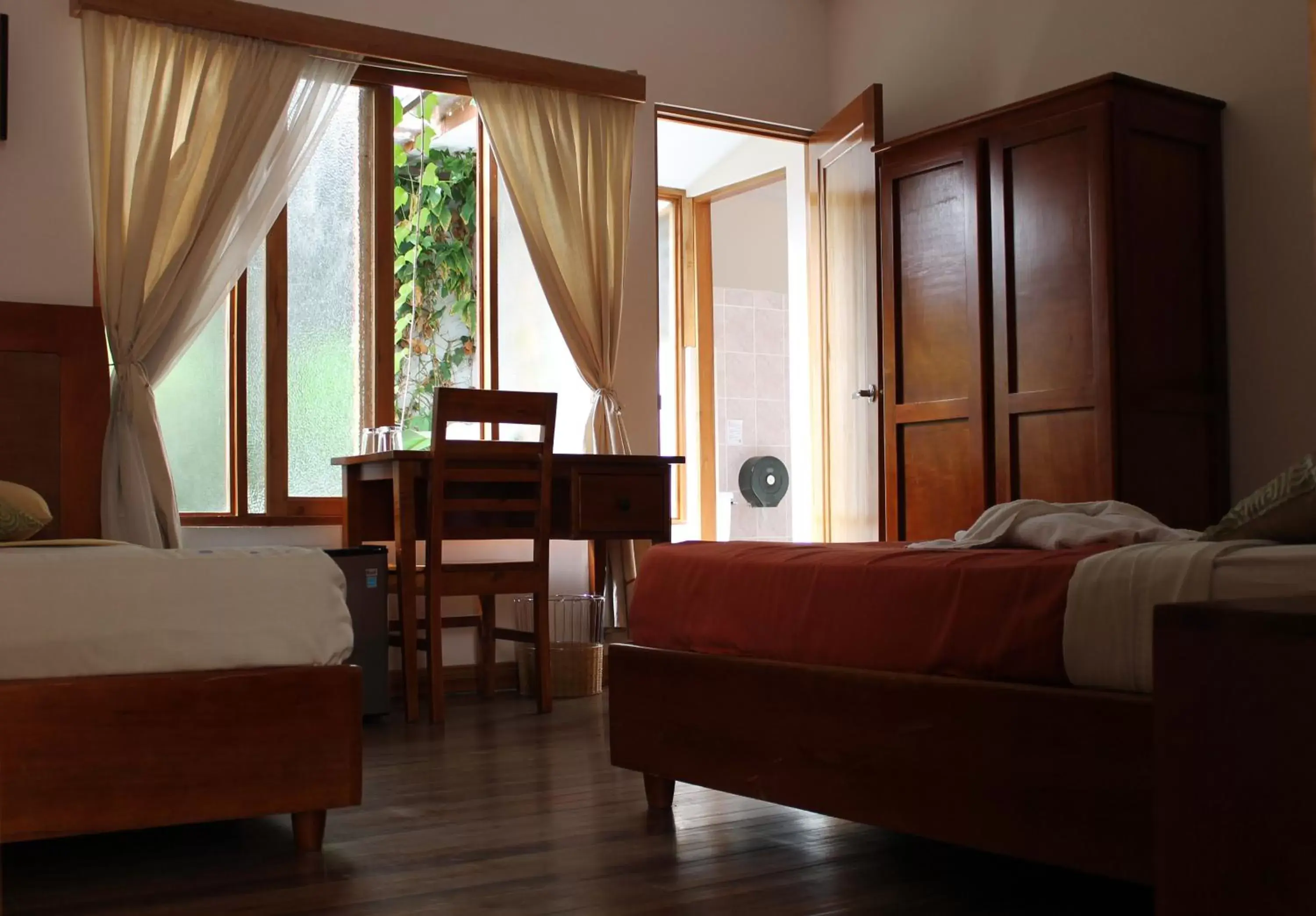 Photo of the whole room, Seating Area in Luz de Luna Boutique Hotel Barrío Escalante