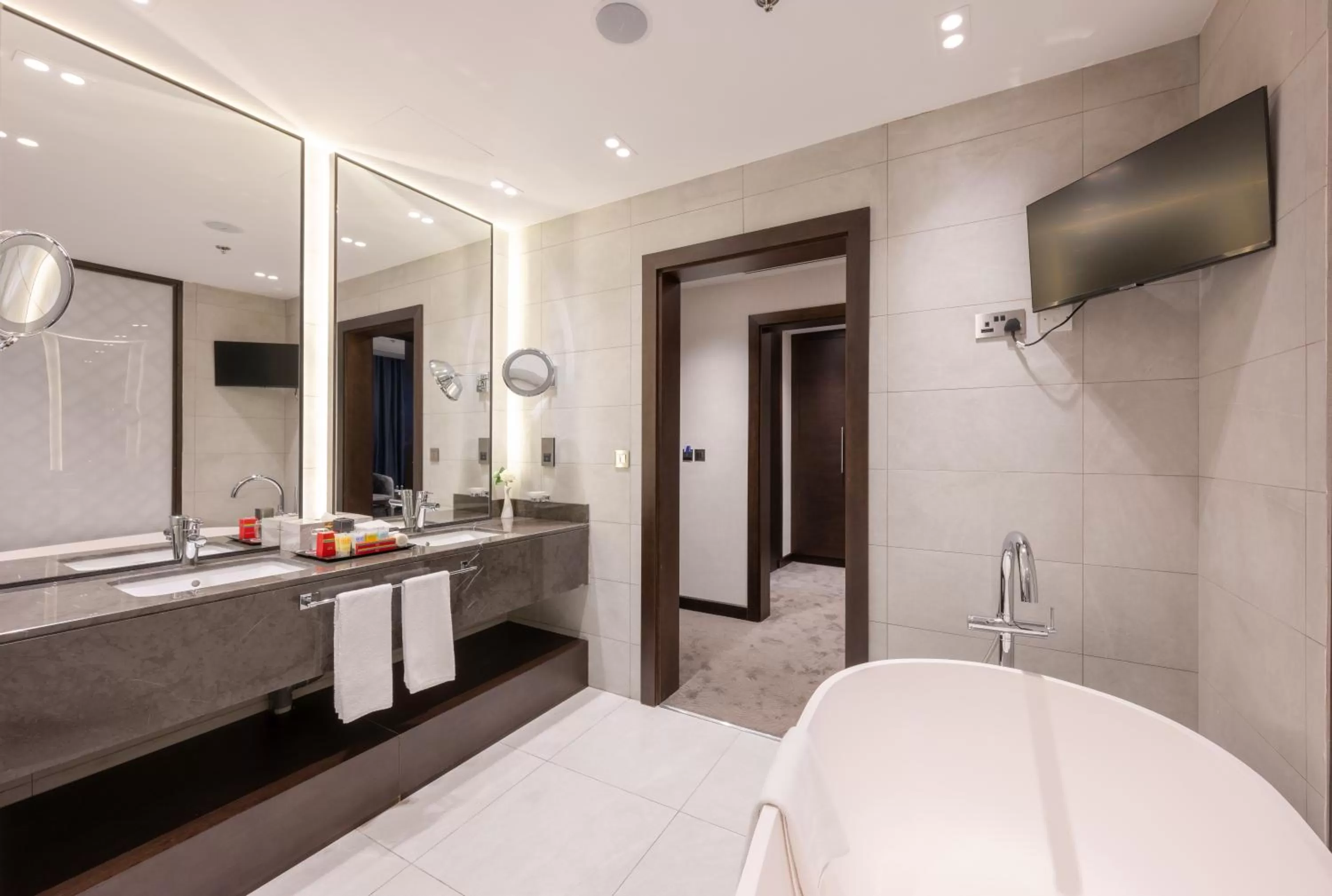 Bathroom, Bed in Ramada Encore Doha by Wyndham