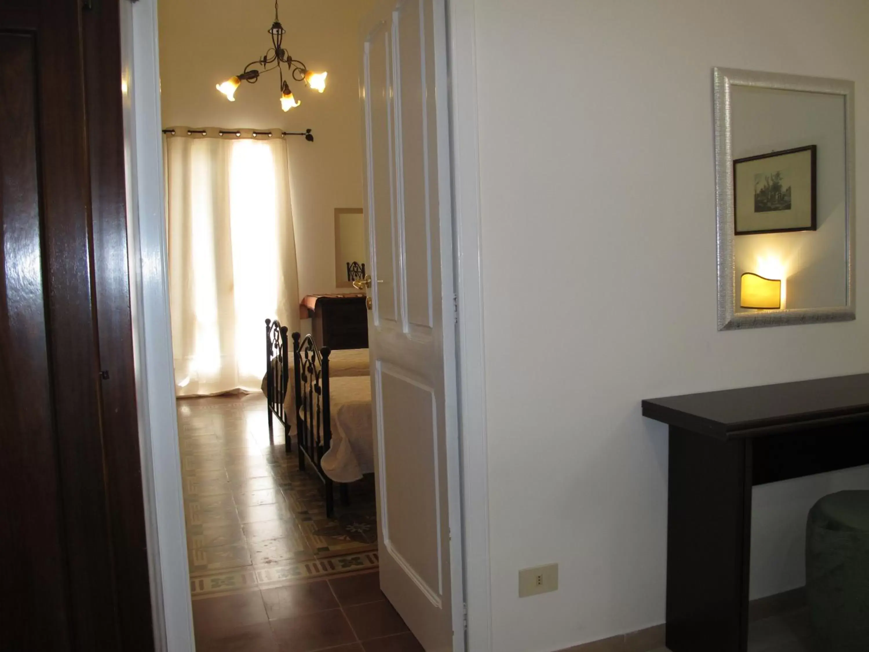 Bedroom, TV/Entertainment Center in B&B 95 a Lecce