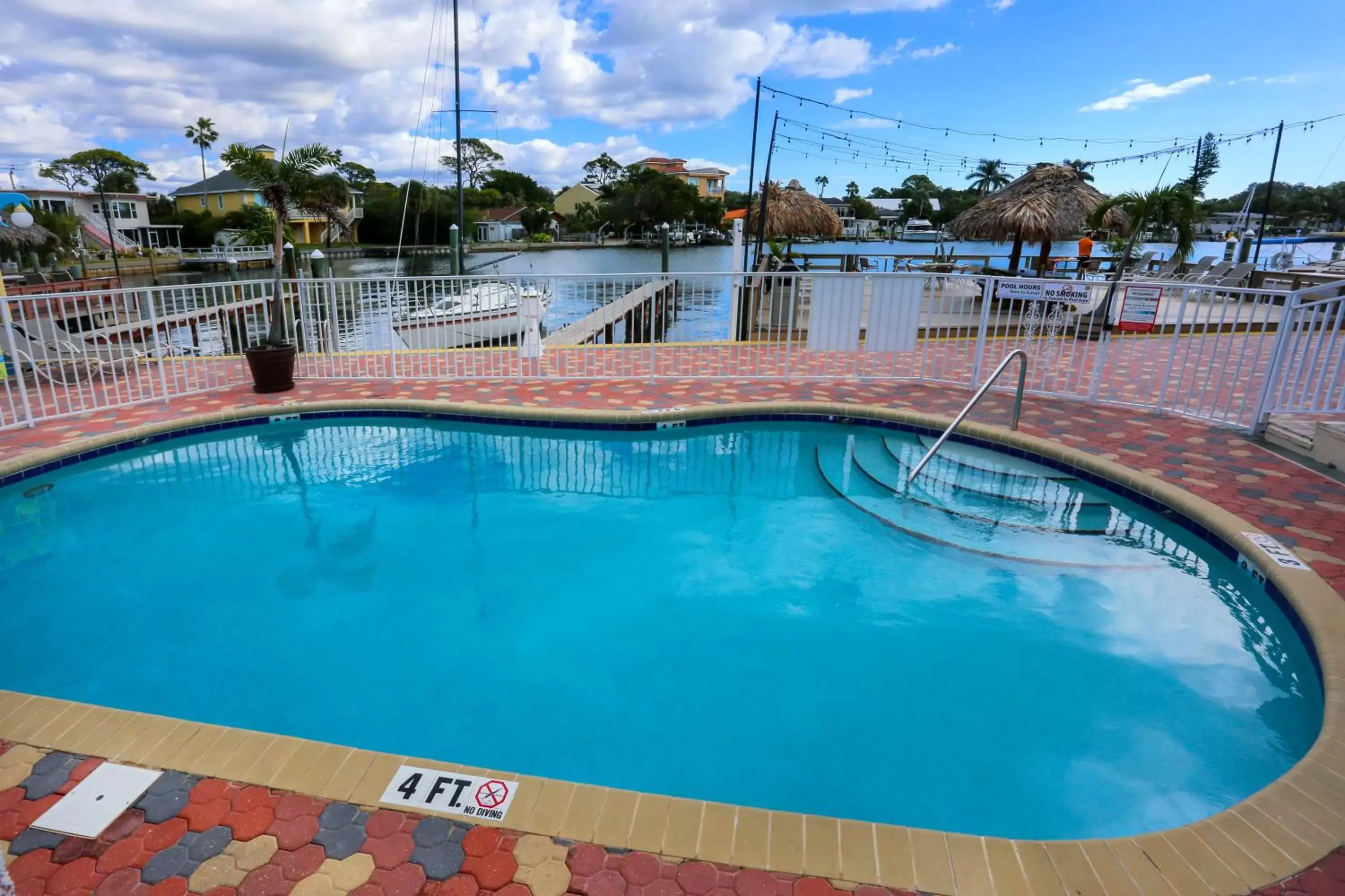 Patio, Swimming Pool in Bay Palms Waterfront Resort - Hotel and Marina