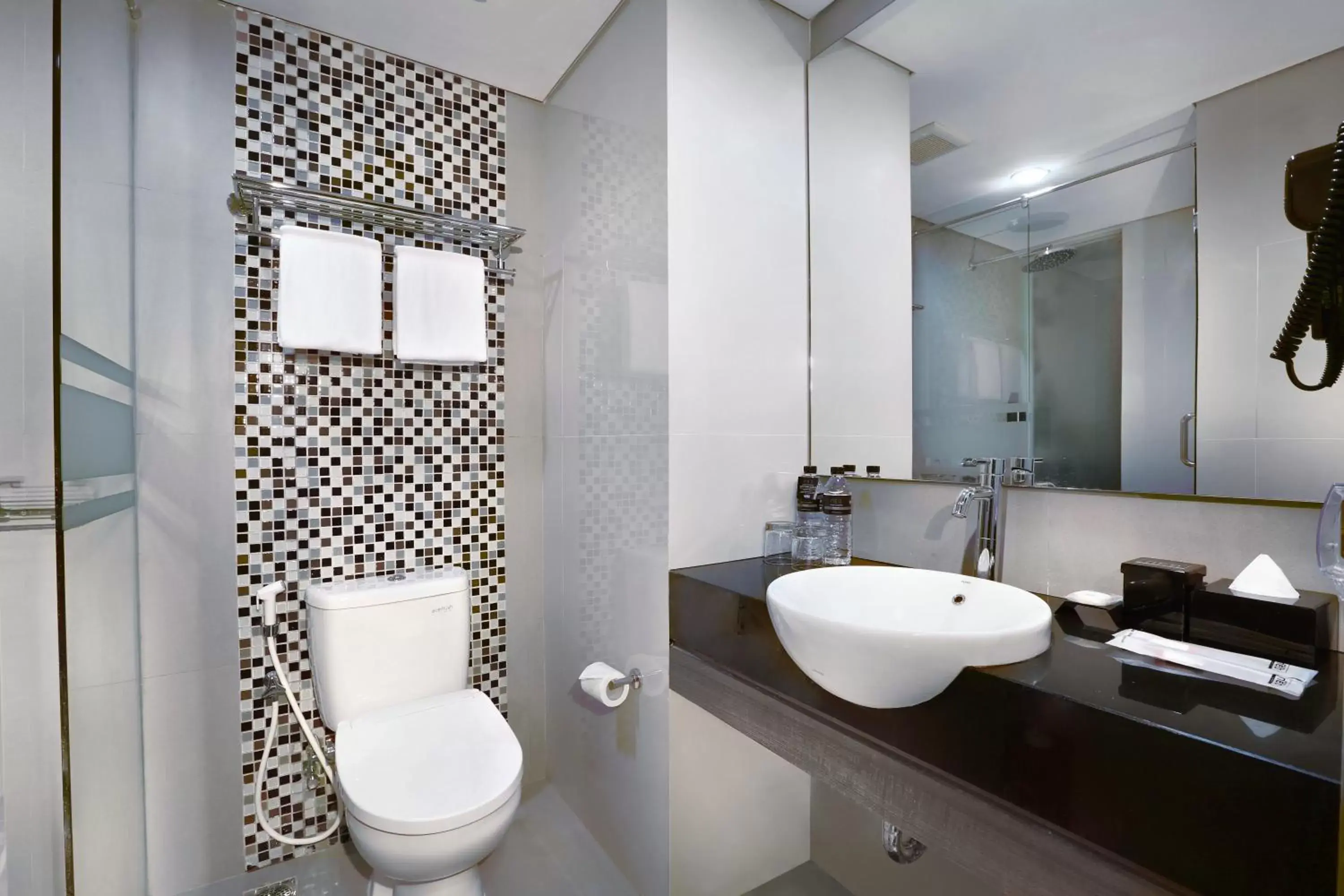 Bathroom in Hotel Neo Malioboro by ASTON