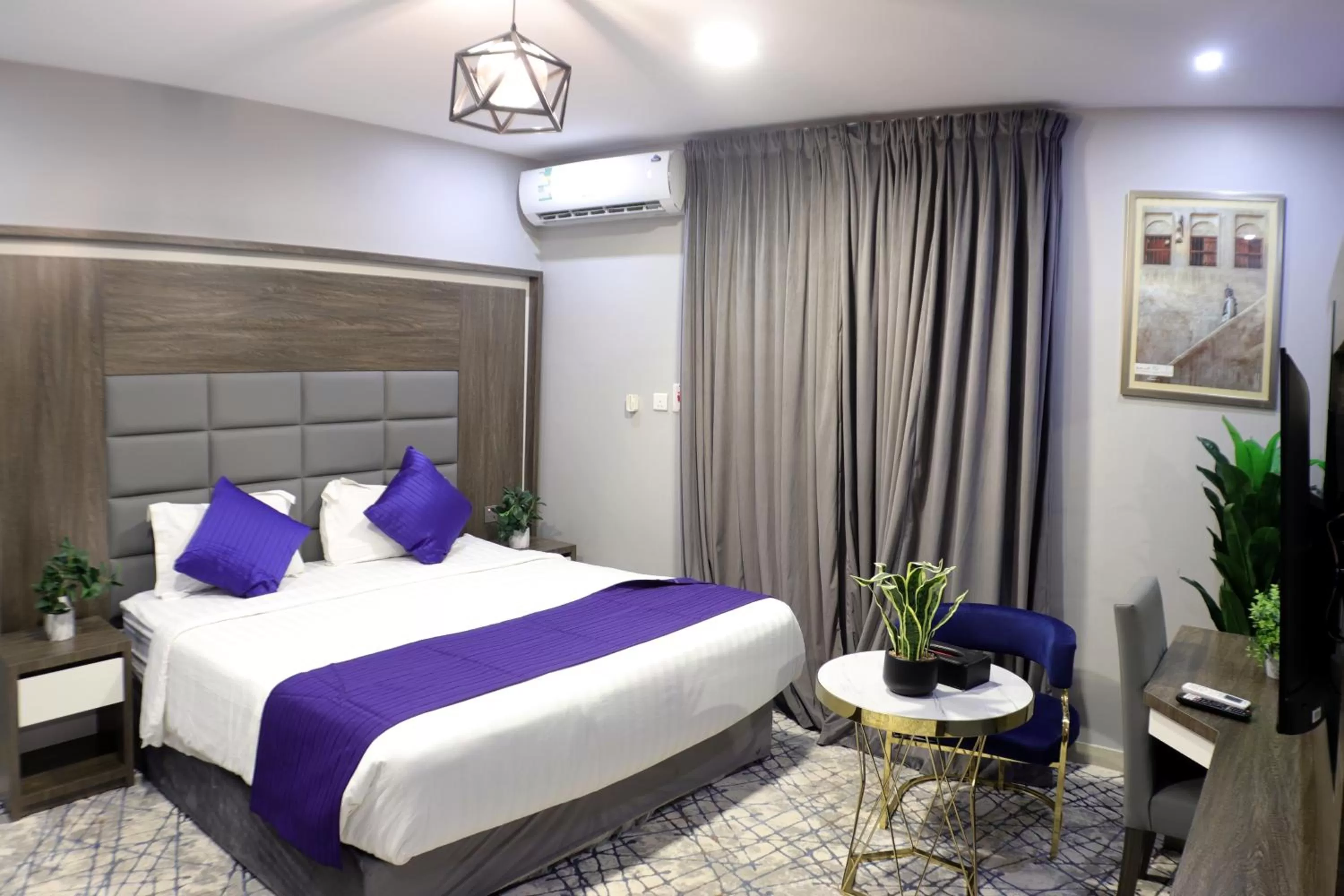Bed in Maskan Al Dyafah Hotel Apartments