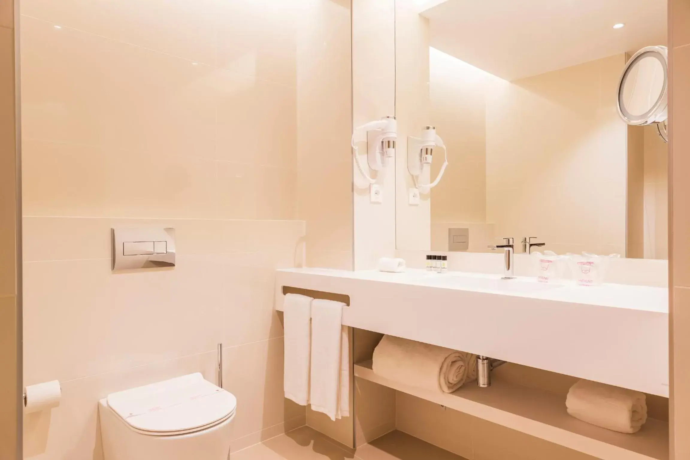 Toilet, Bathroom in The Patio Suite Hotel