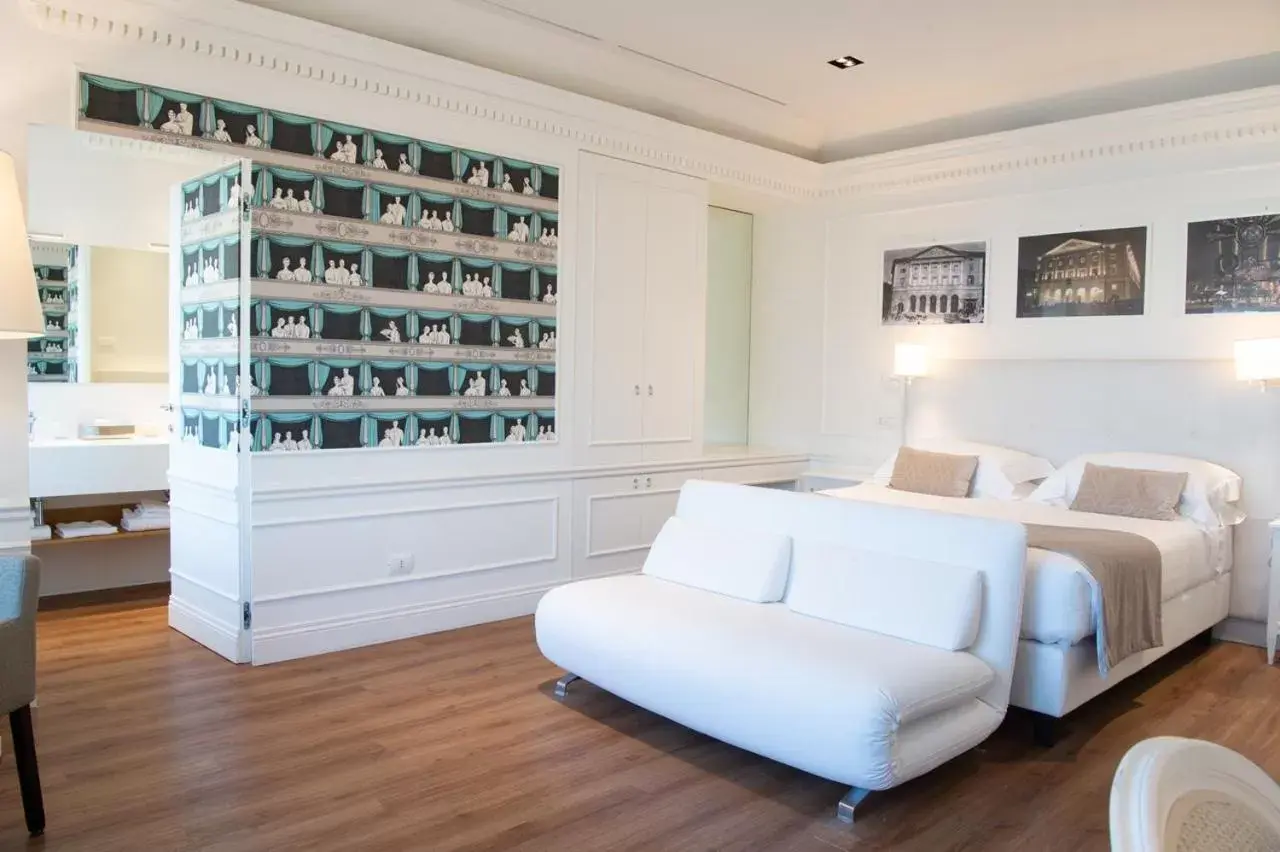 Bedroom, Seating Area in Grand Hotel Palace