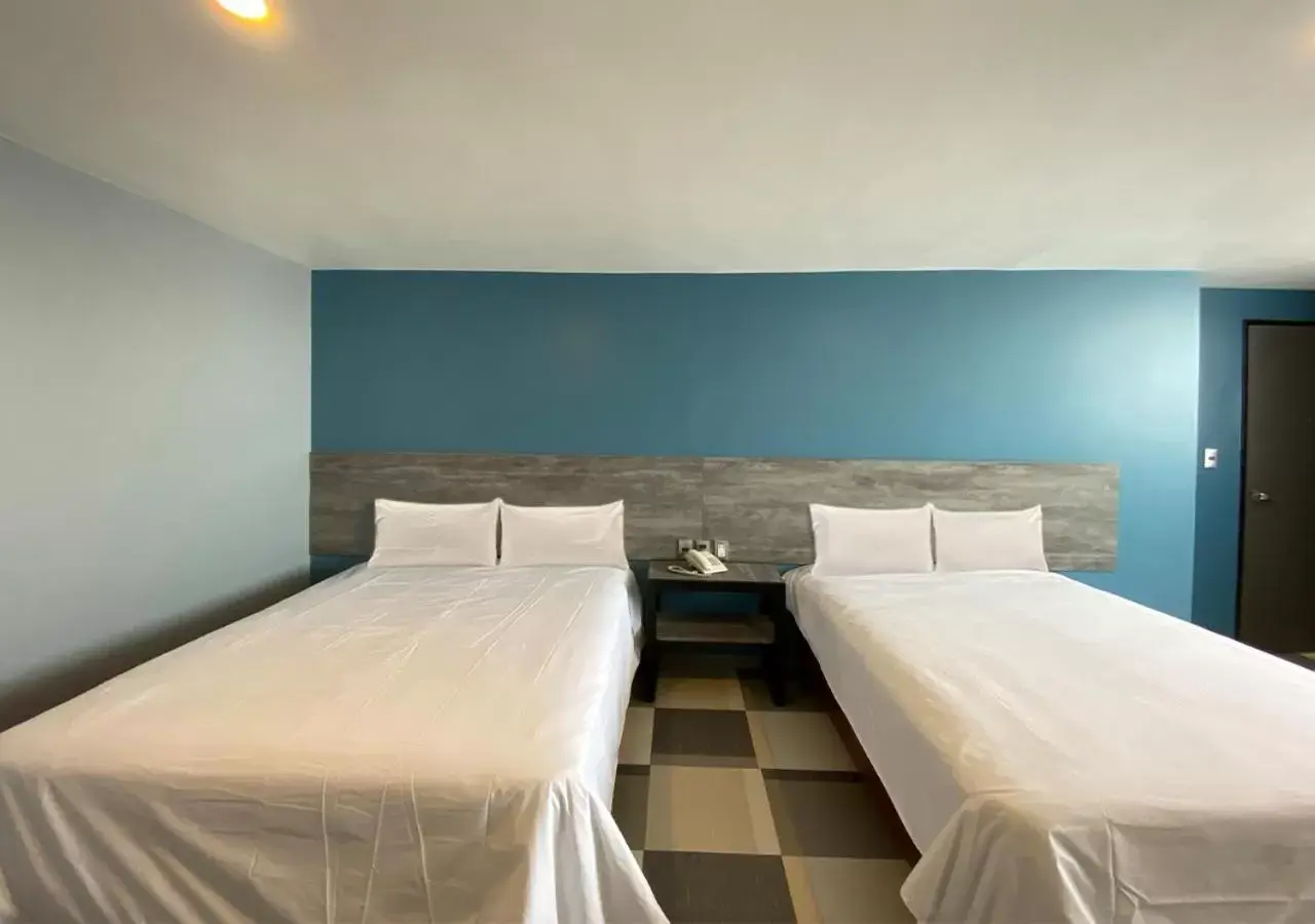 Bed in Hotel Estrella de Oriente