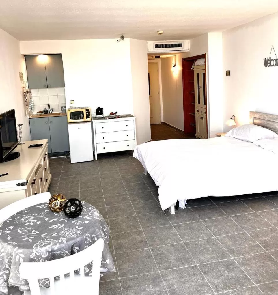 Bed in Raphael Apartments