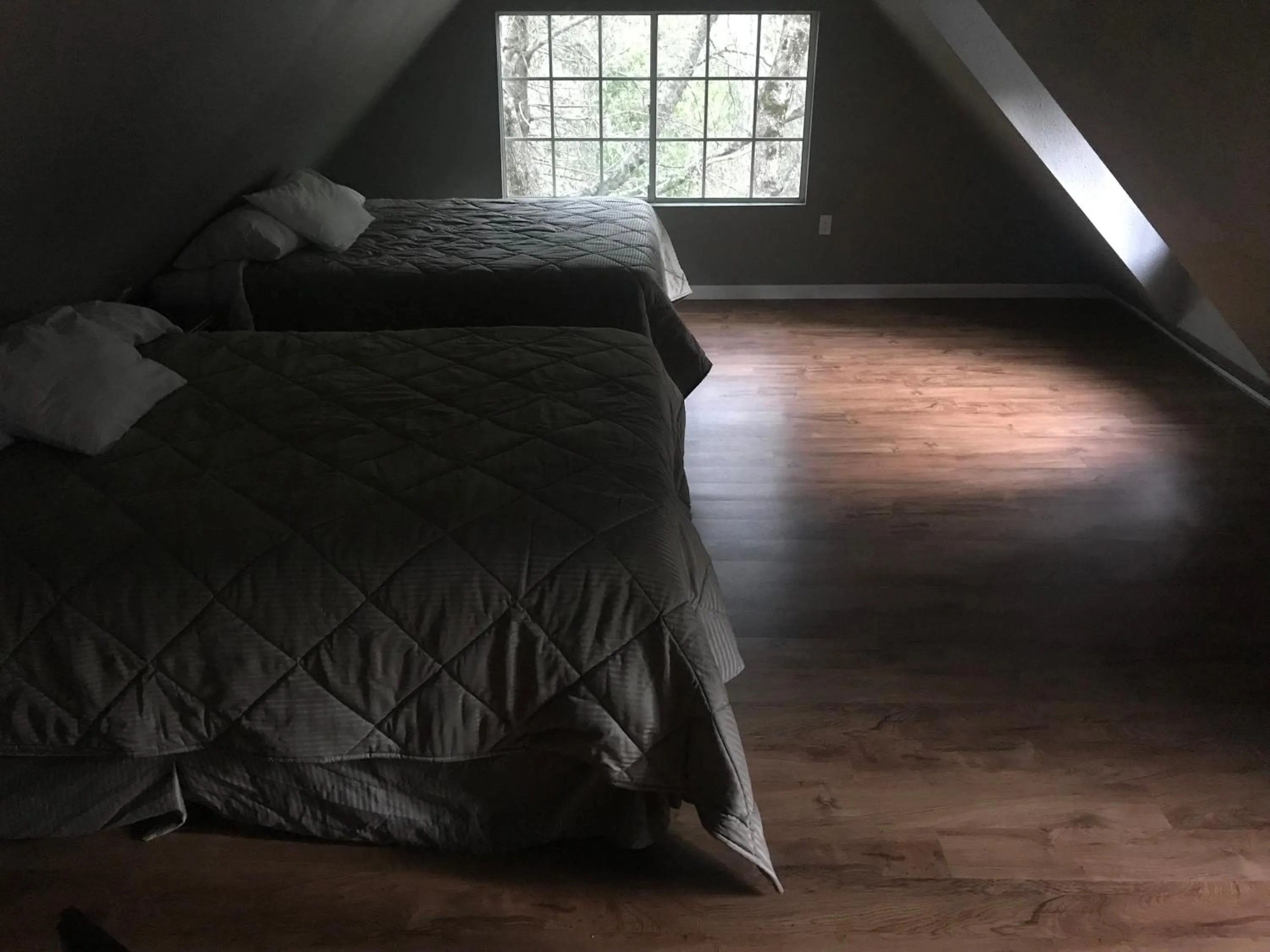 Bed in Mountain Trail Lodge and Vacation Rentals