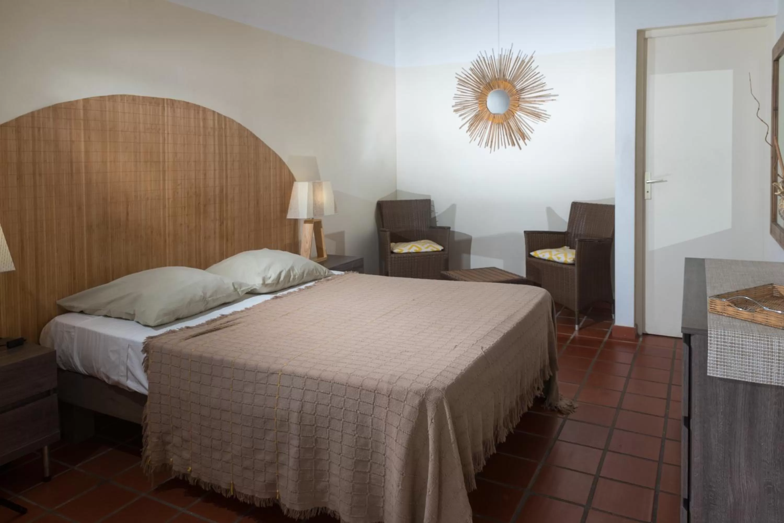 Photo of the whole room, Bed in Hôtel Les Bananiers