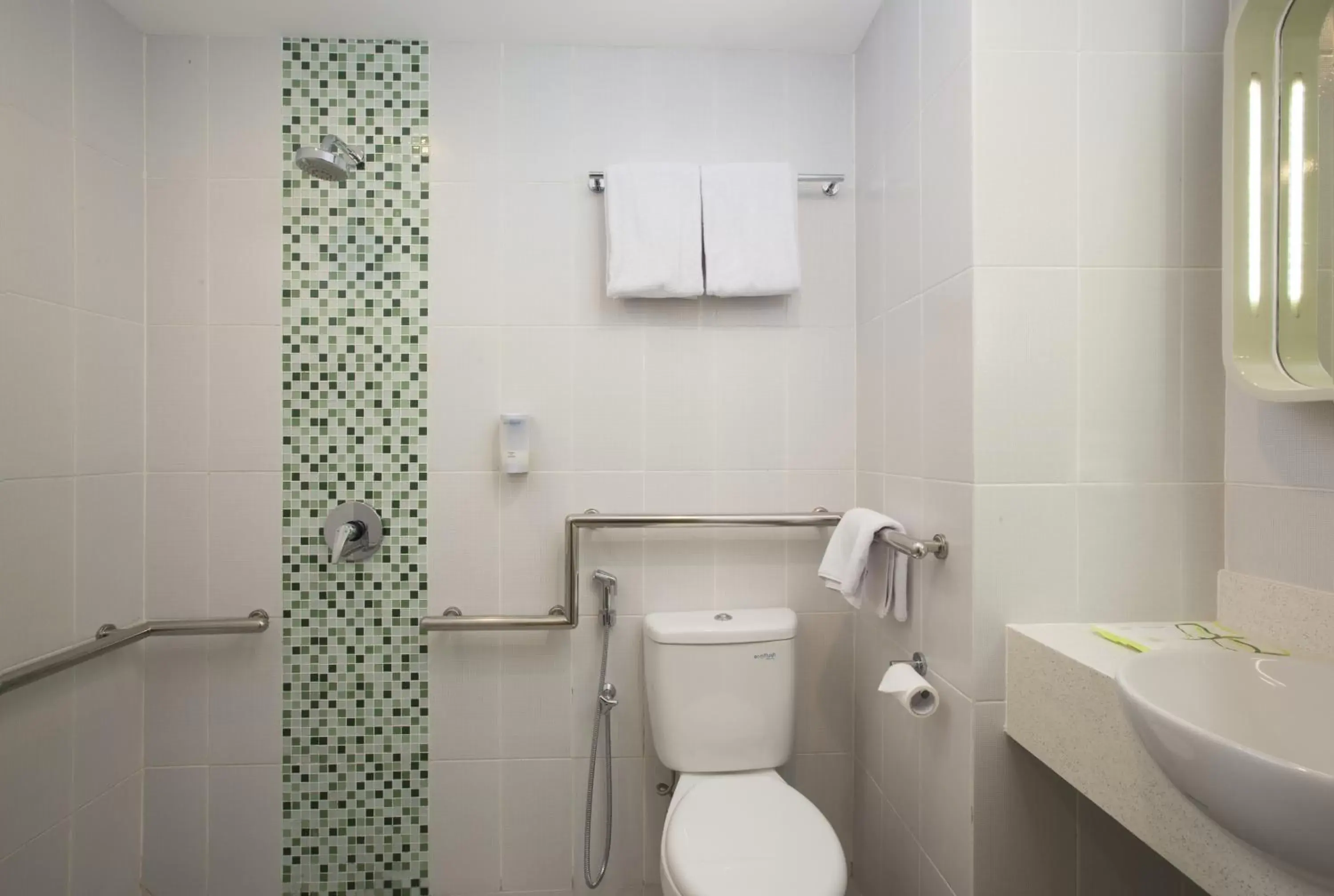 Bathroom in Zest Bogor by Swiss-Belhotel International