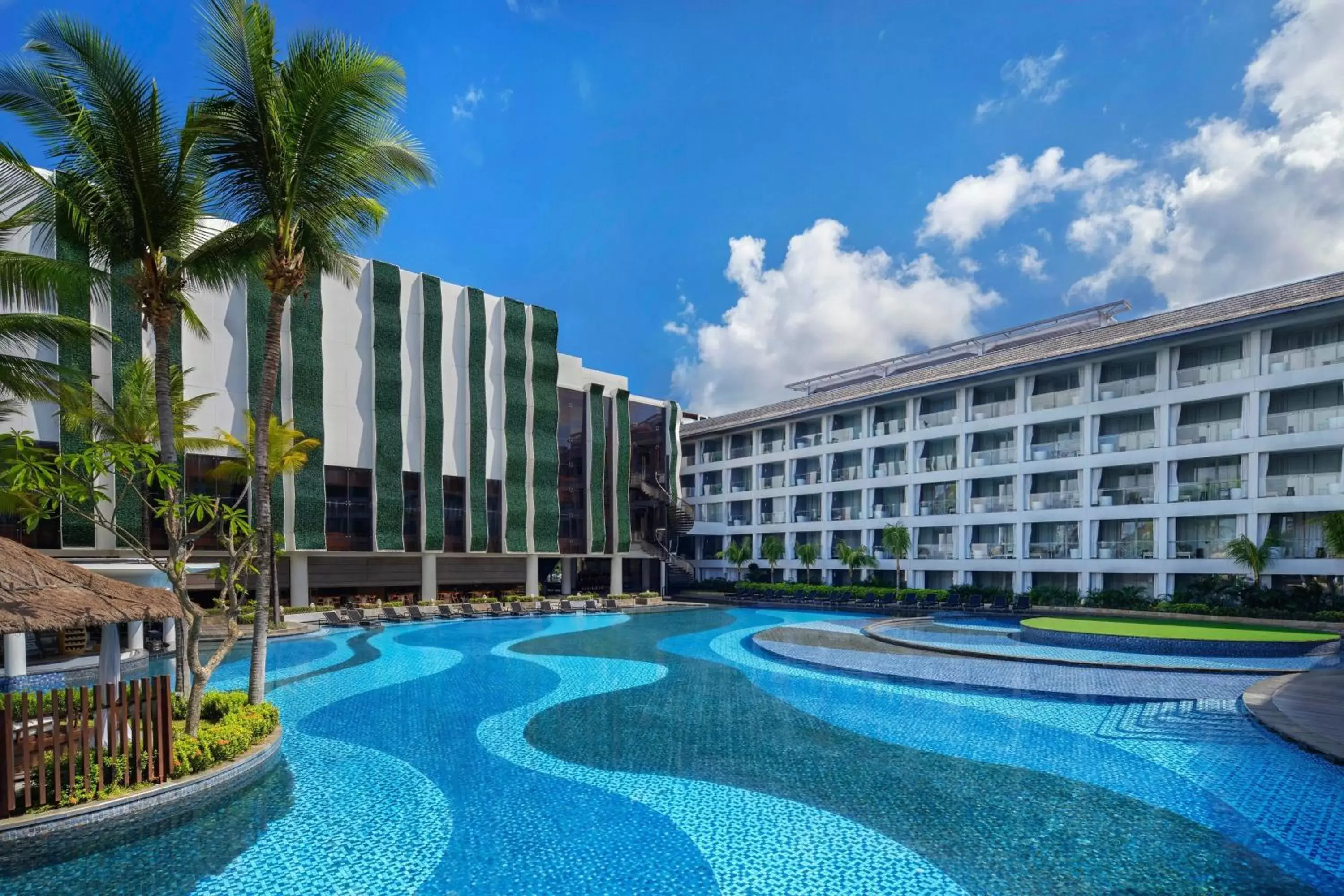 Swimming pool, Property Building in The Stones - Legian, Bali - A Marriott Autograph Collection Hotel