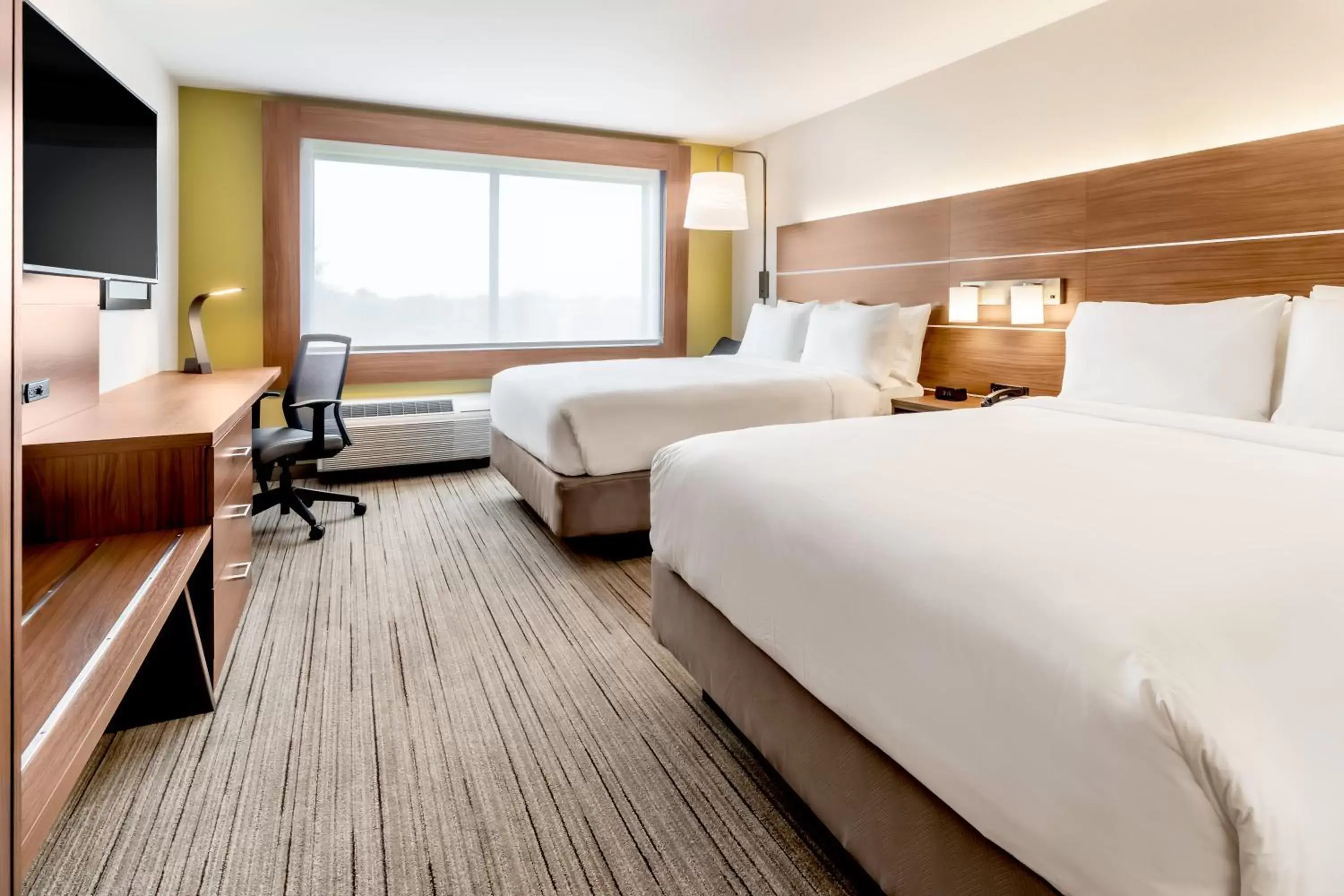 Bed in Holiday Inn Express & Suites - Milwaukee West Allis, an IHG Hotel