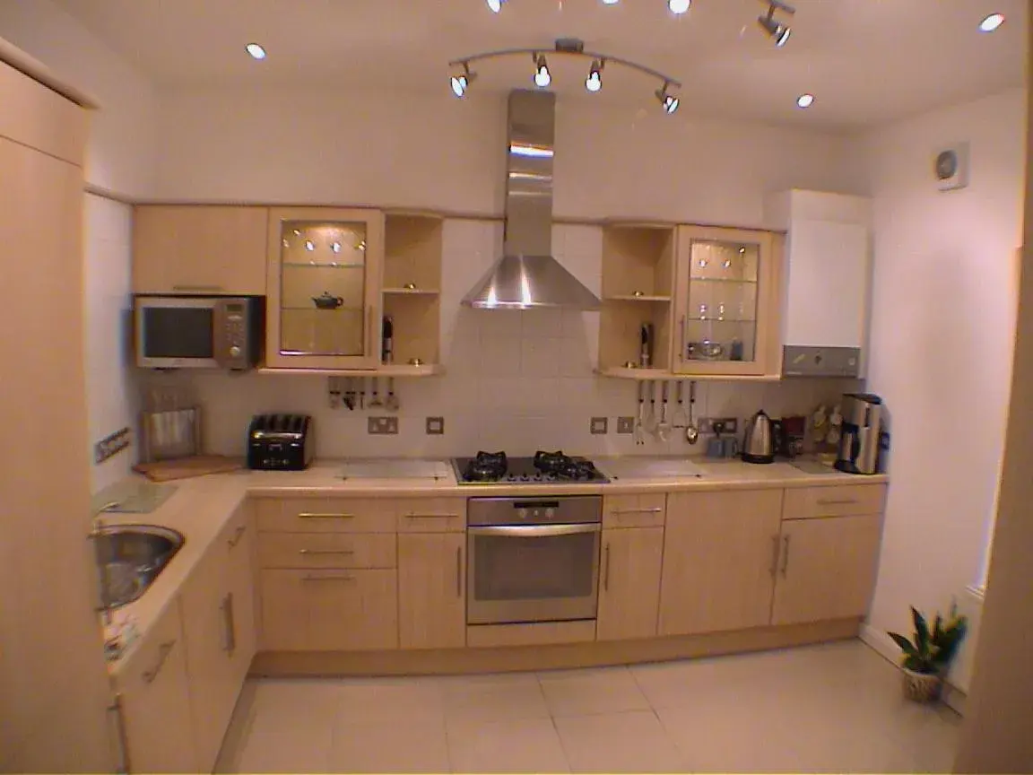 Kitchen/Kitchenette in Earle House Serviced Apartments