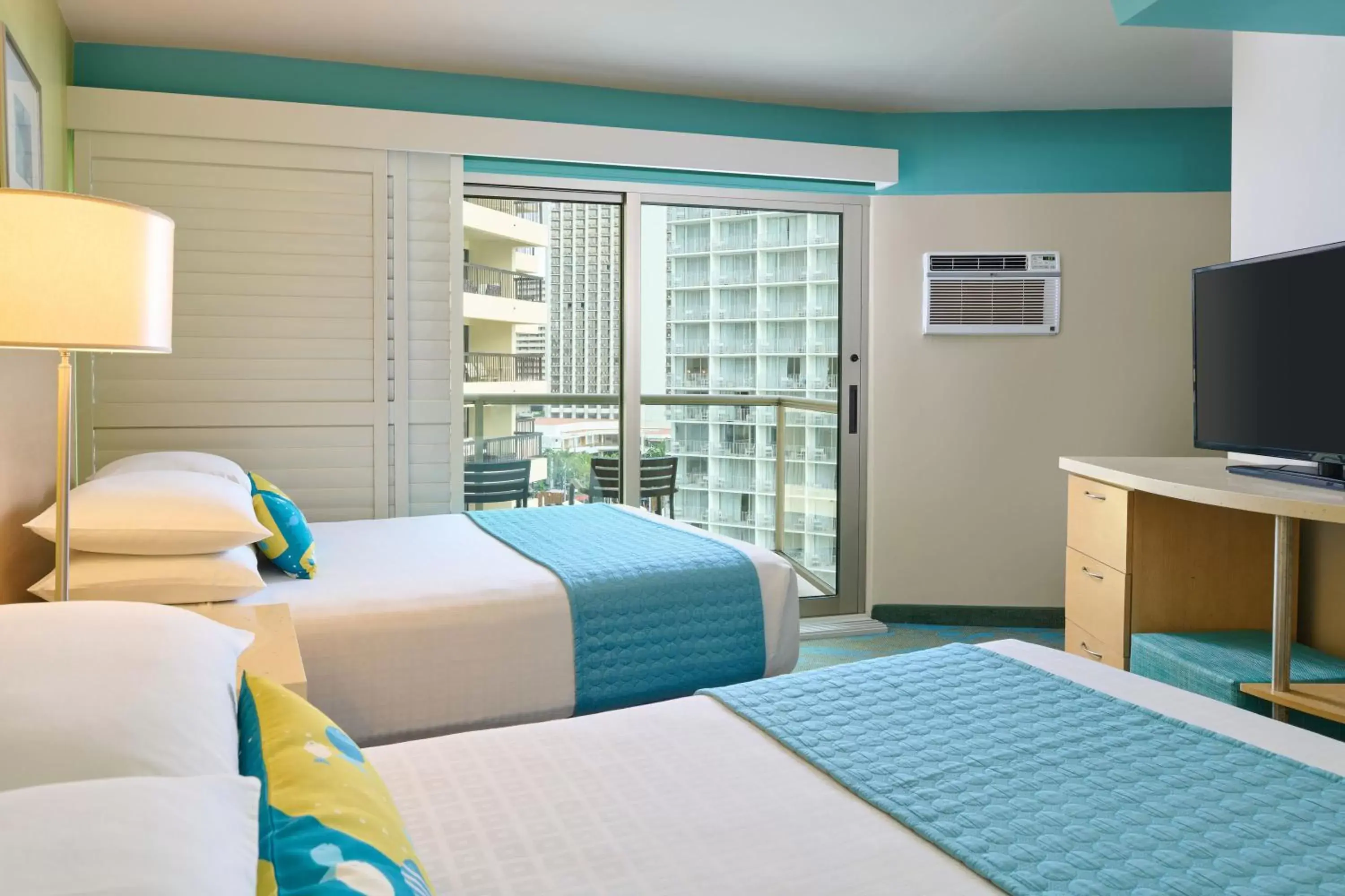 Bed in Aston Waikiki Circle Hotel