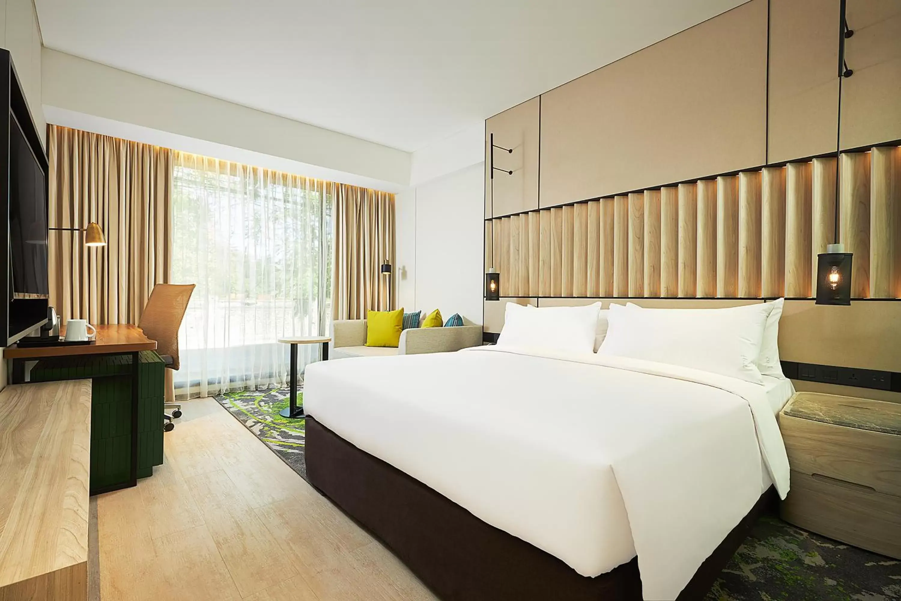 Bed in Holiday Inn Bali Sanur, an IHG Hotel