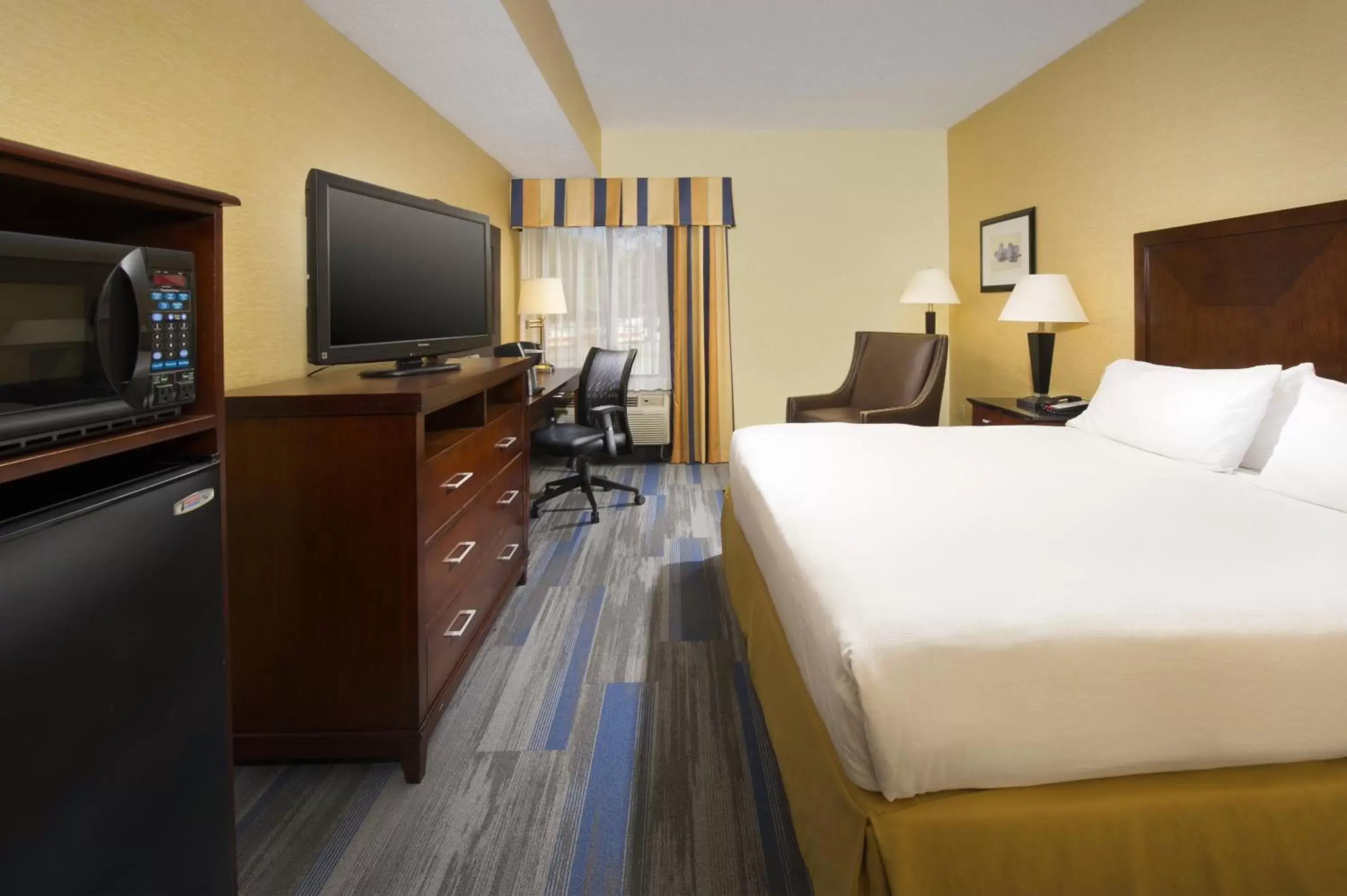 Photo of the whole room, TV/Entertainment Center in Holiday Inn Express Washington DC-BW Parkway, an IHG Hotel