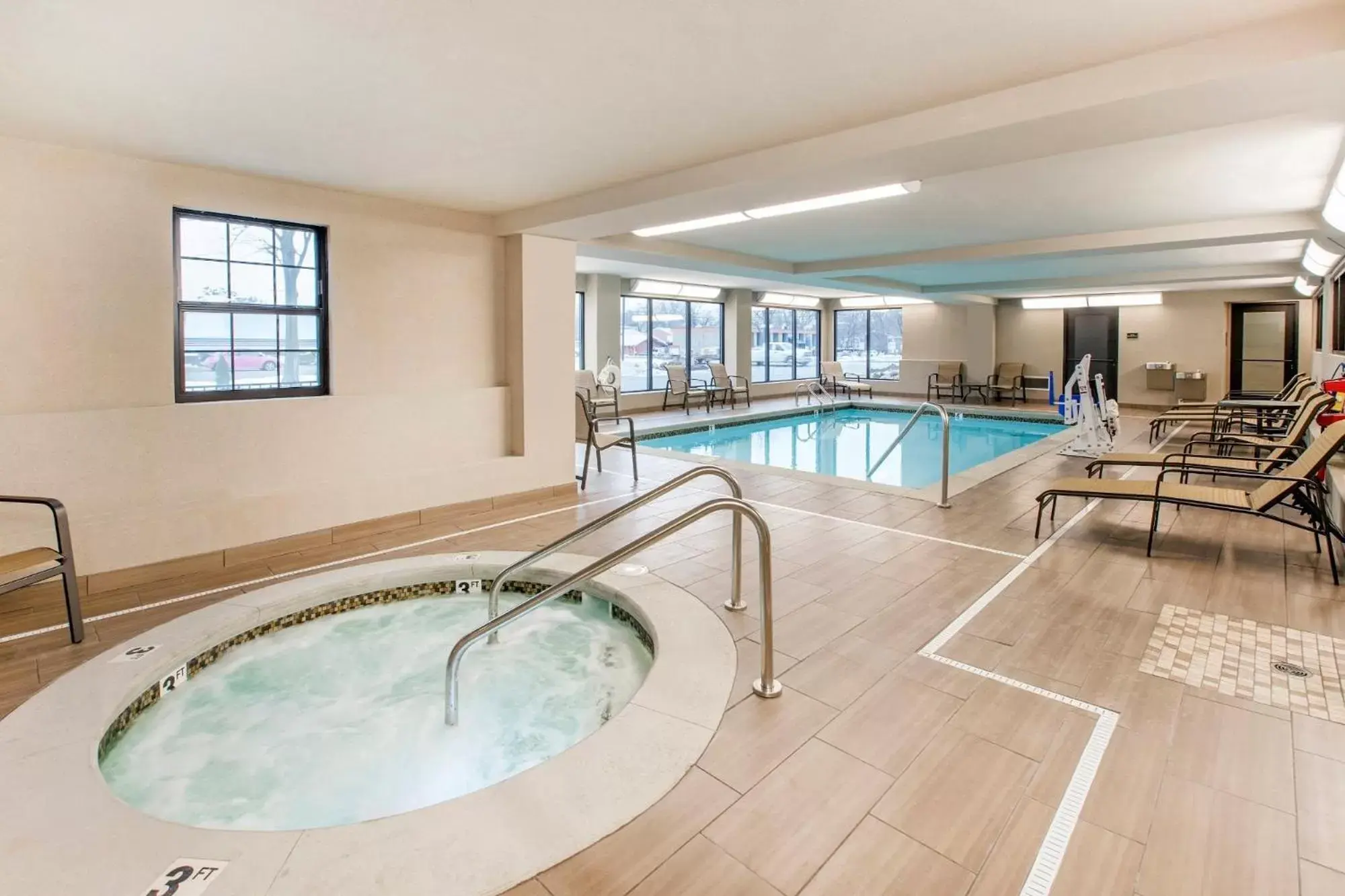 Swimming Pool in Country Inn & Suites by Radisson, Grandville-Grand Rapids West, MI