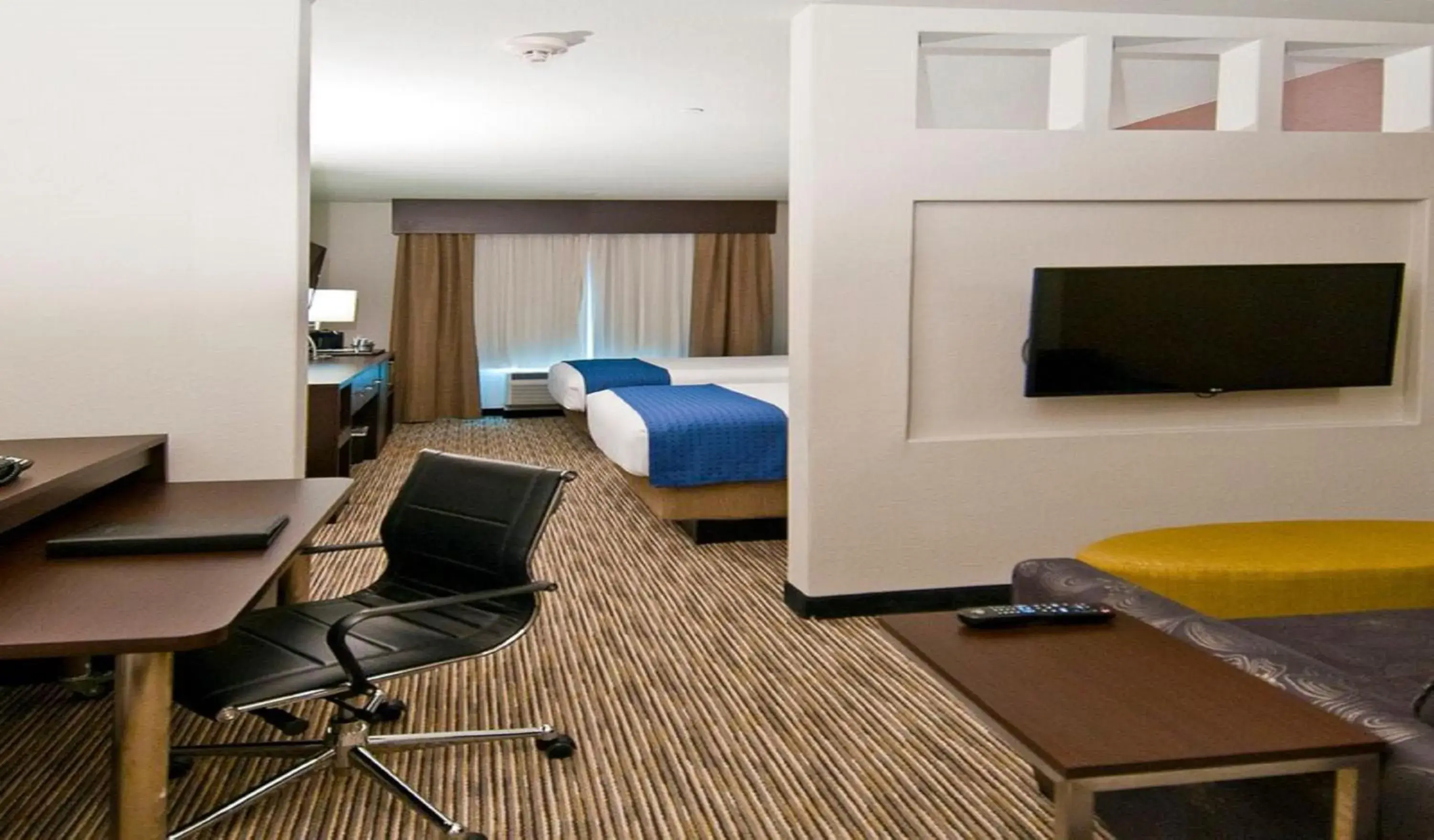 Photo of the whole room, TV/Entertainment Center in Holiday Inn Austin Airport, an IHG Hotel