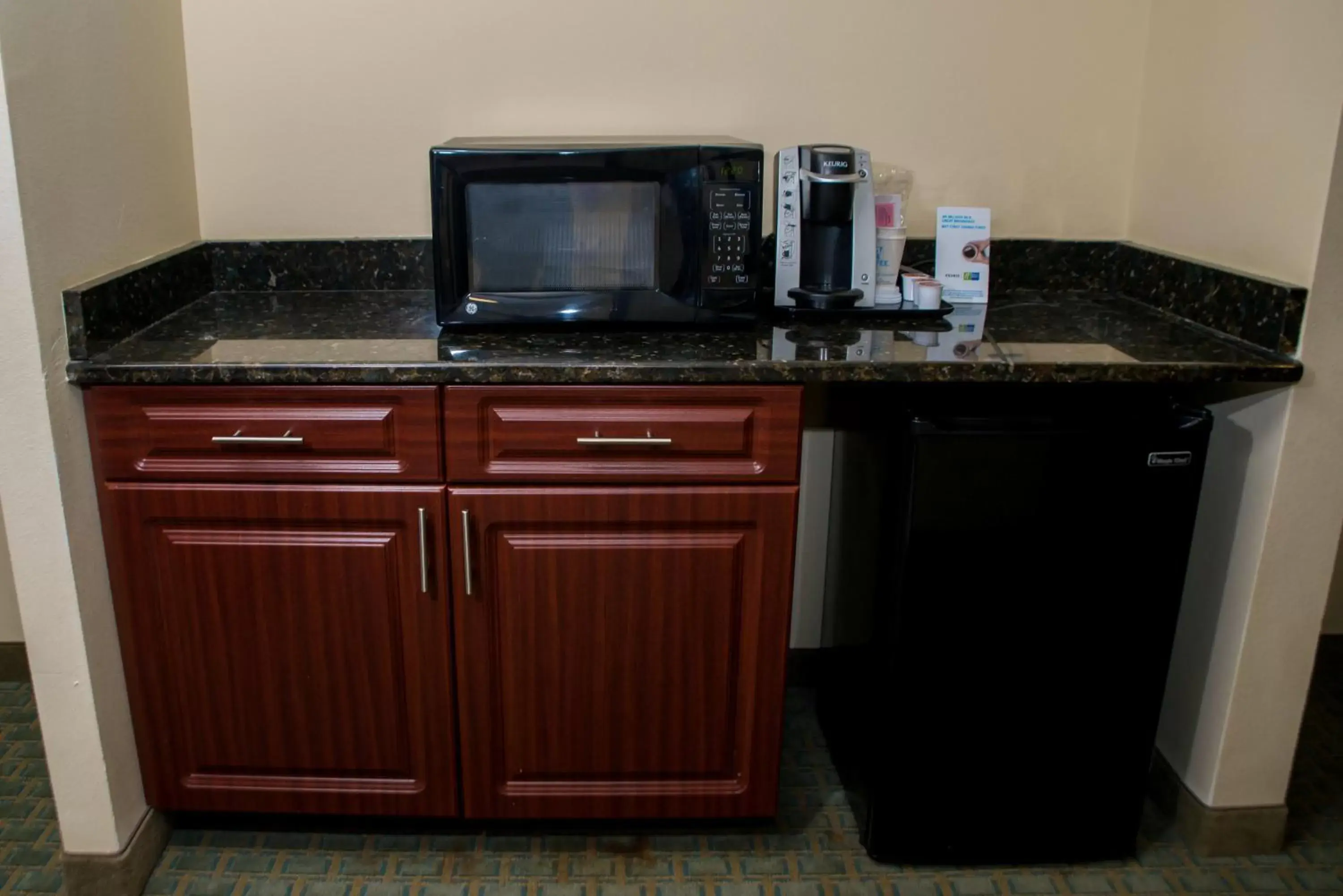 Photo of the whole room, TV/Entertainment Center in Holiday Inn Express Hotel & Suites Cocoa, an IHG Hotel