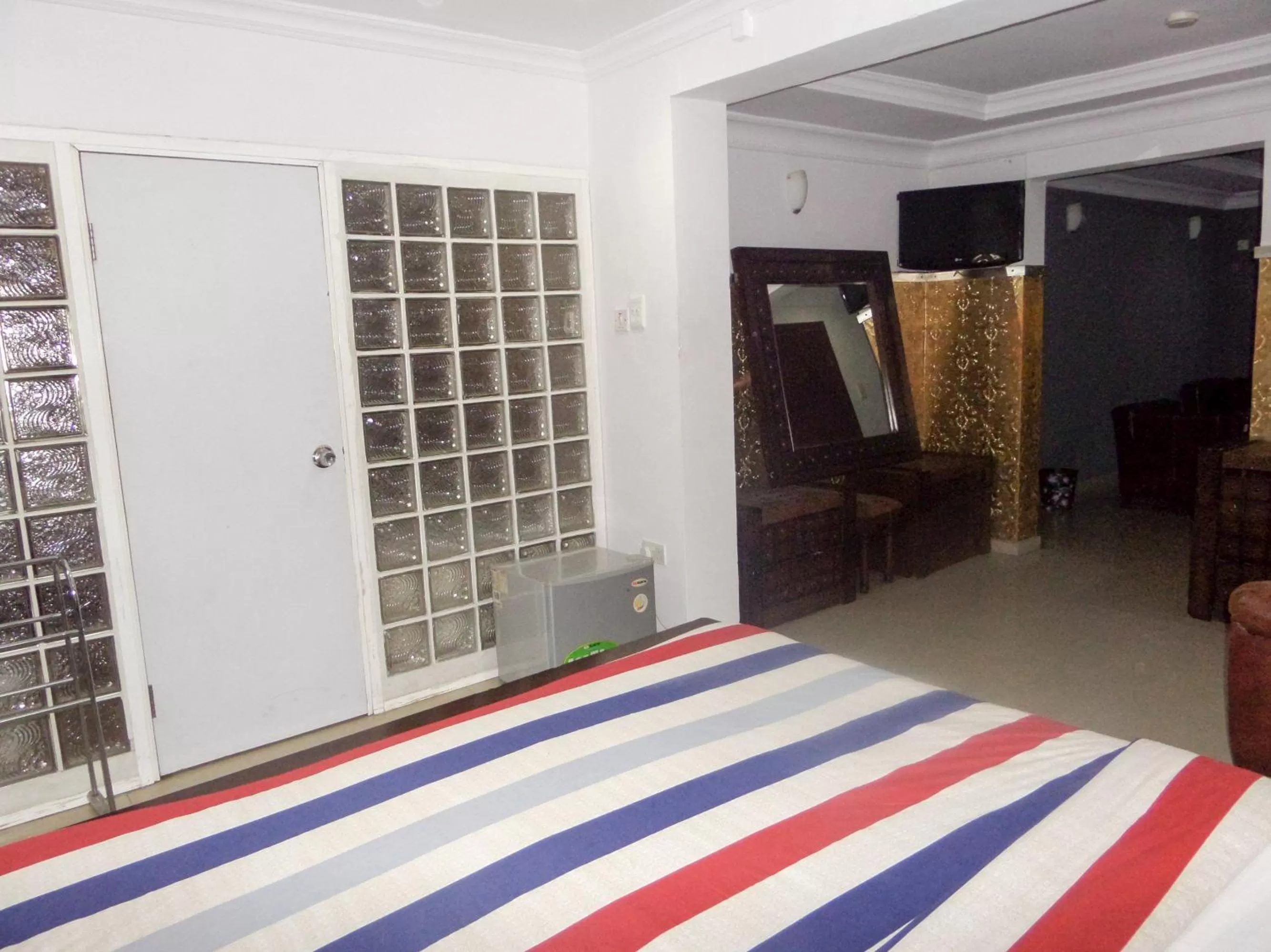 Bed in TheoDawn Hotels @ Suite 29