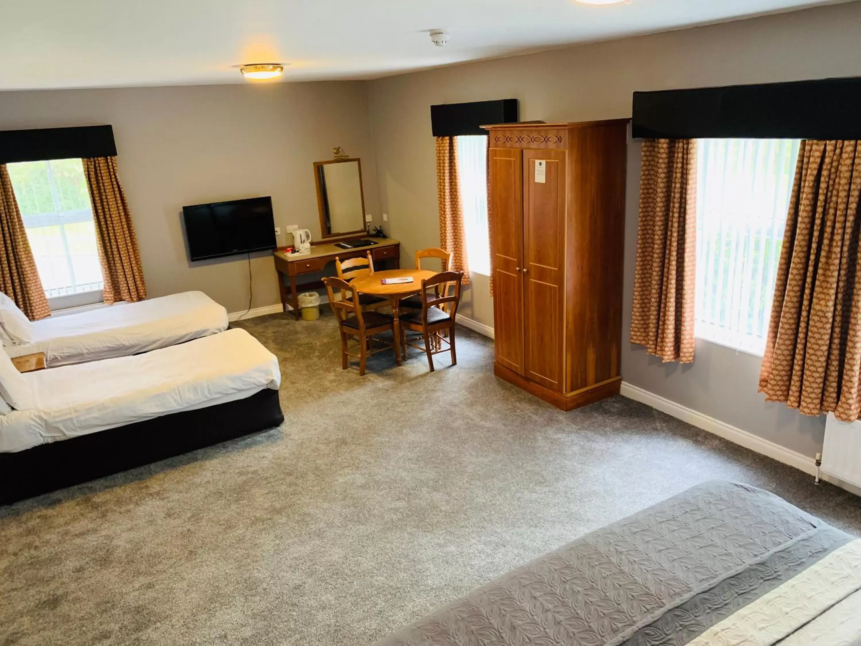 Bedroom, Seating Area in The Bannville Hotel