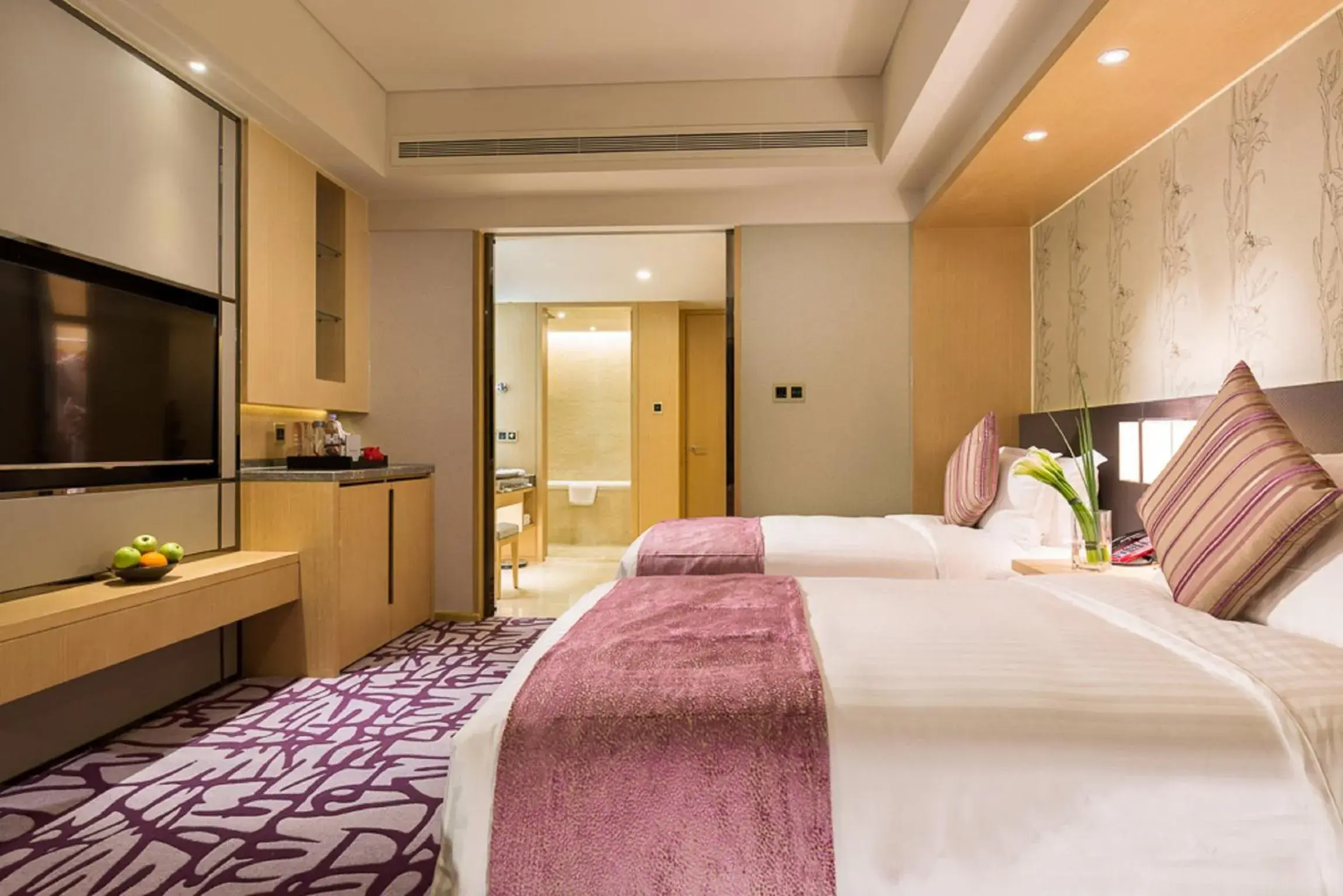 Bed in Swiss Grand Nanchang (Swiss International Hotel Nanchang)