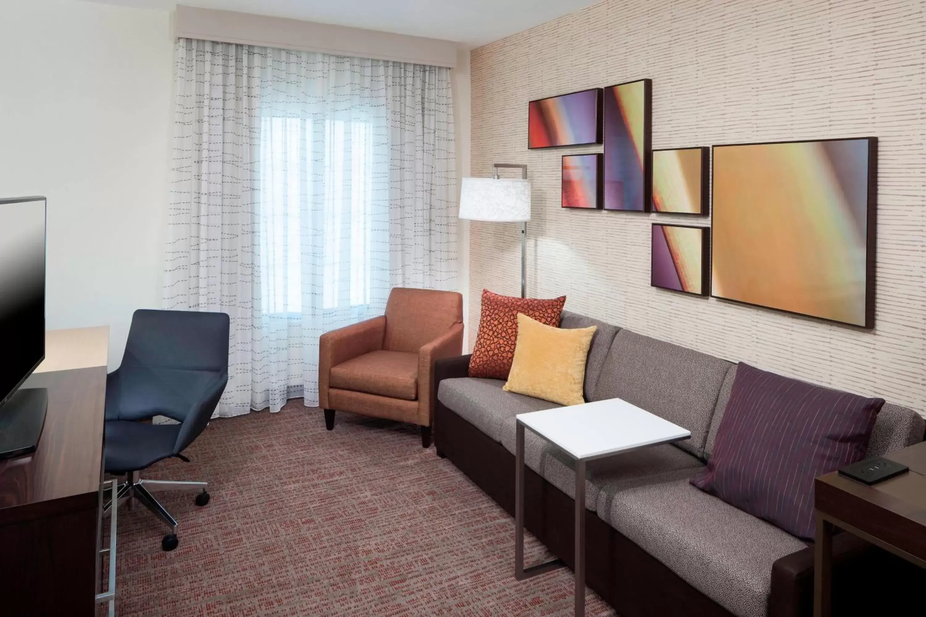 Living room, Seating Area in Residence Inn by Marriott Near Universal Orlando