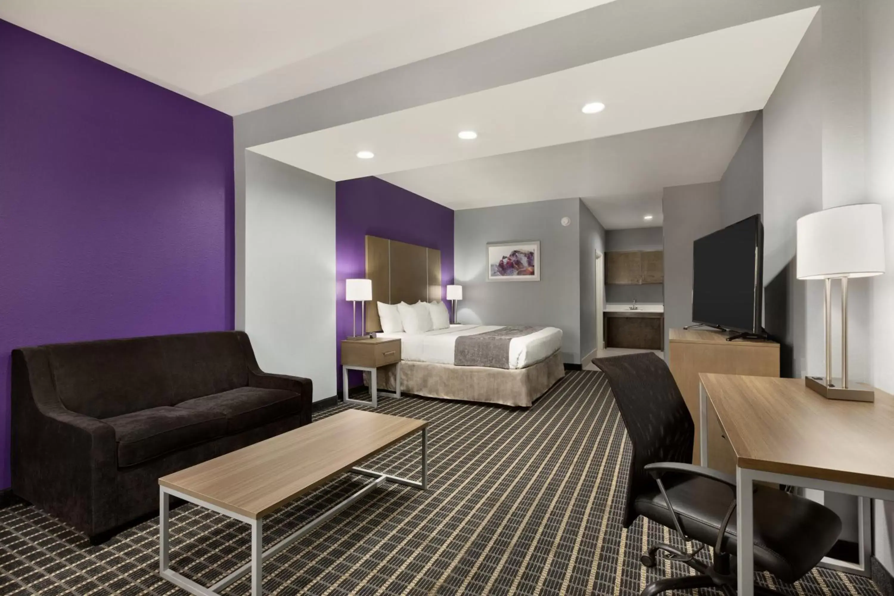 Bed, Seating Area in Days Inn by Wyndham Odessa