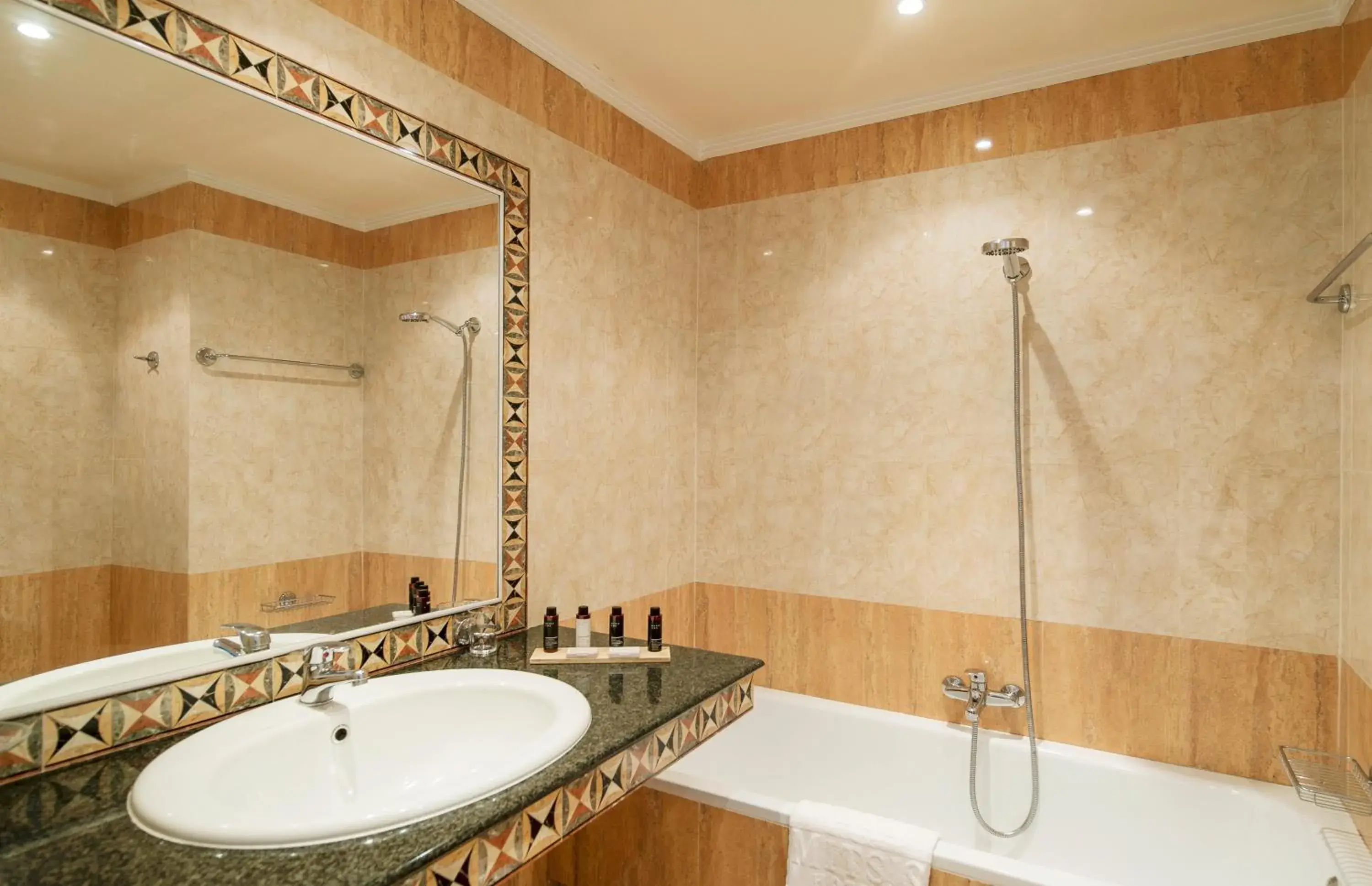 Bathroom in Mitsis Petit Palais Beach Hotel