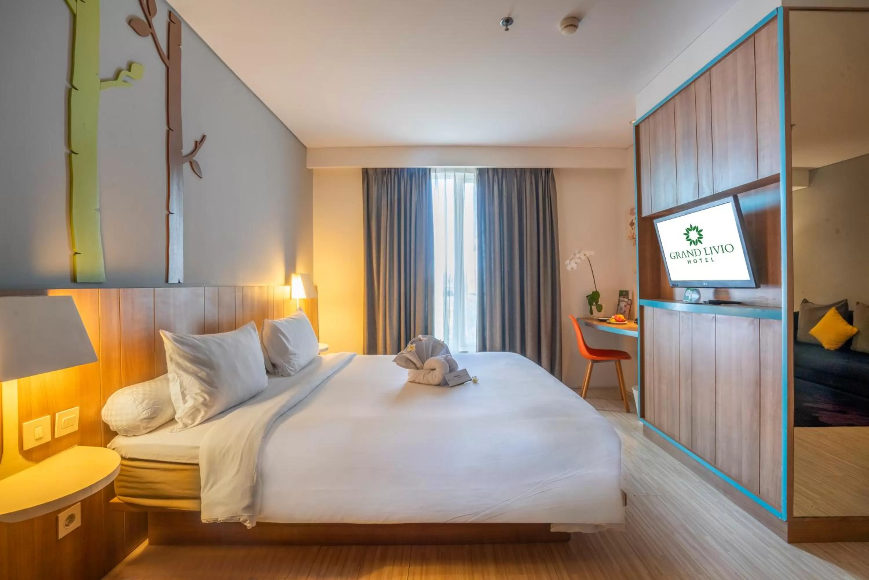 Bedroom, Bed in Grand Livio Kuta Hotel