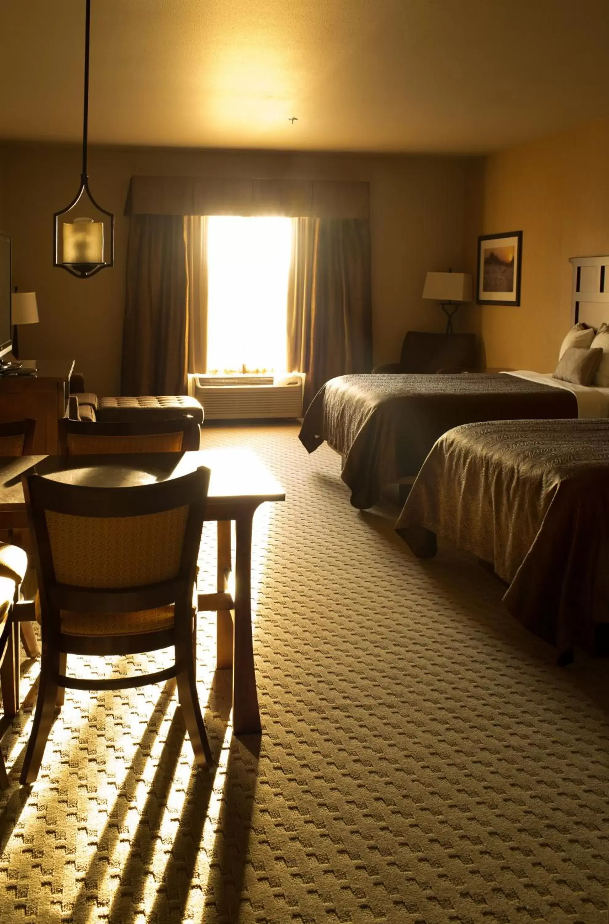 Bed in Teddy's Residential Suites Watford City
