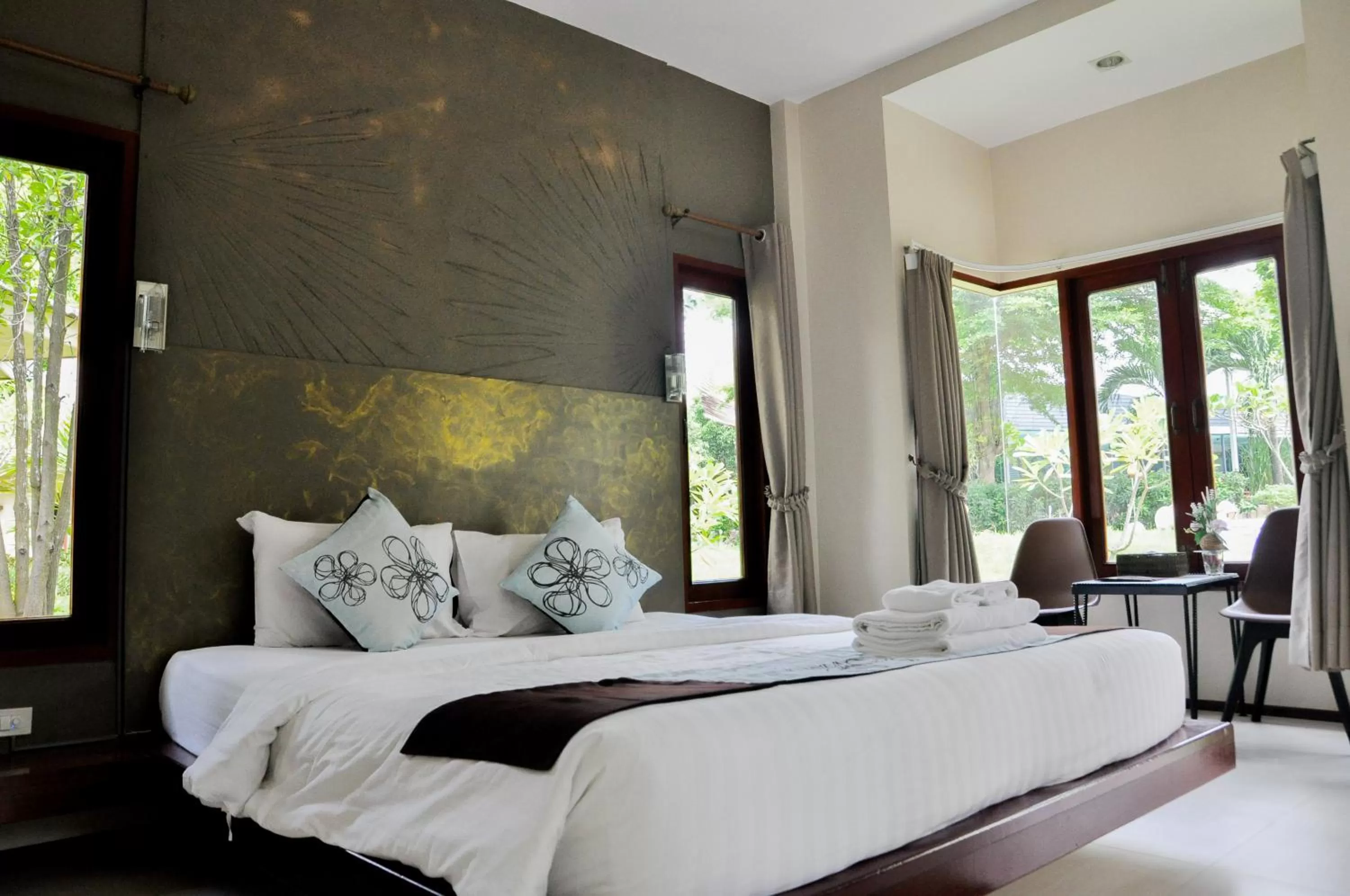 Bed in Panlaan Boutique Resort